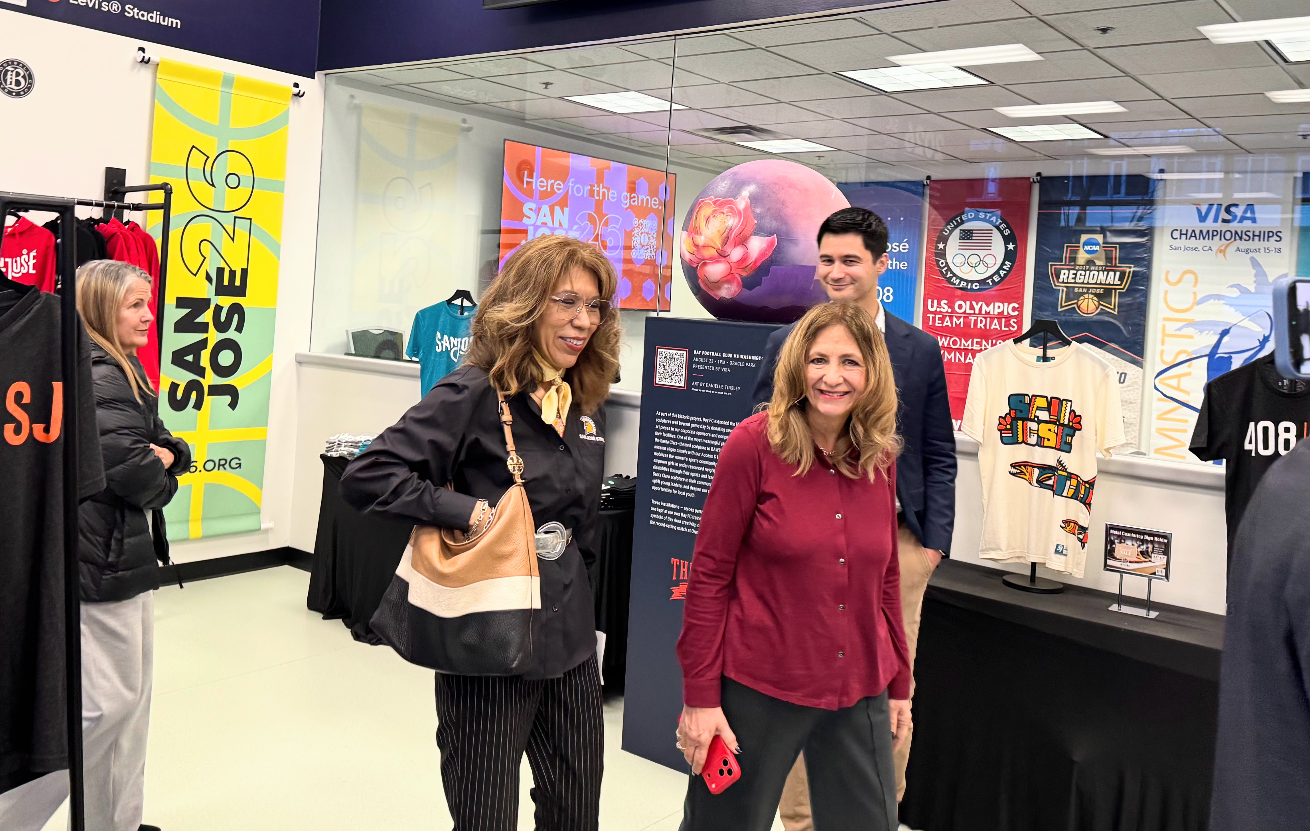 San Jose State President Cynthia Teniente-Matson, left, walks with San...
