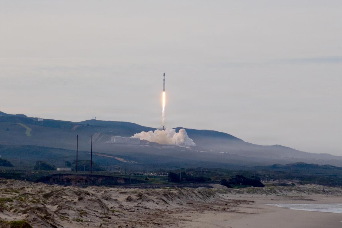 A Falcon 9 rocket carrying the Starlink 17-20 mission launches from Vandenberg Space Force Base