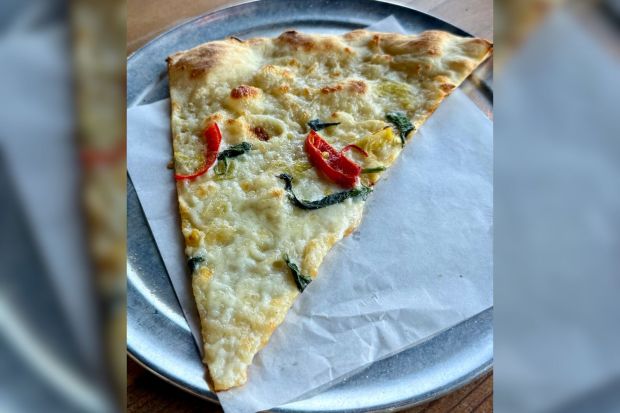The Slice & Pint in El Segundo serves its Grand Ave. Pizza with white sauce by the slice on Saturdays. (Photo by Fielding Buck, The Press-Enterprise/SCNG)