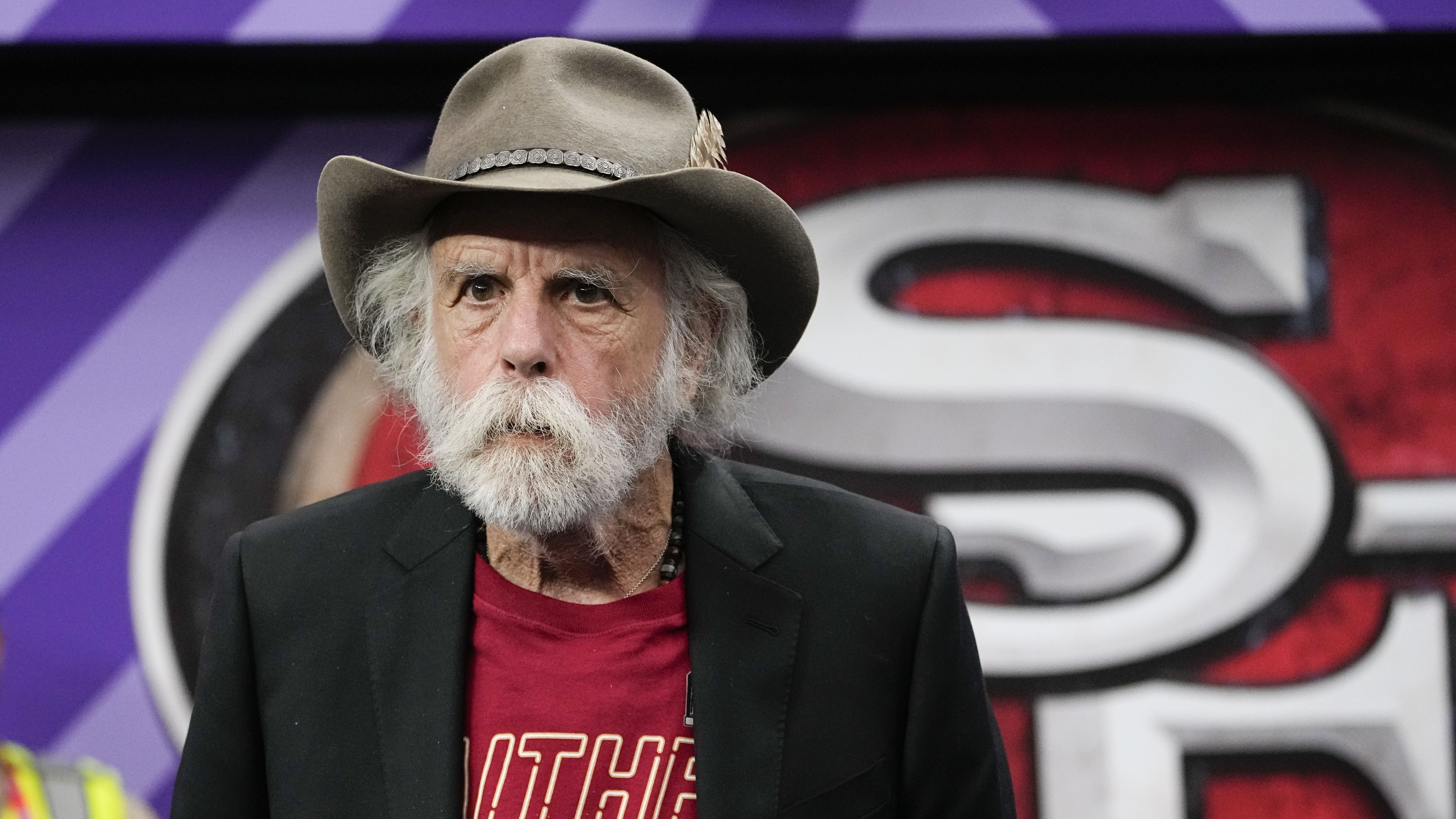 Bob Weir walks the field before the NFL Super Bowl 58 football game between the San Francisco 49ers and the Kansas City Chiefs, Sunday, Feb. 11, 2024, in Las Vegas.