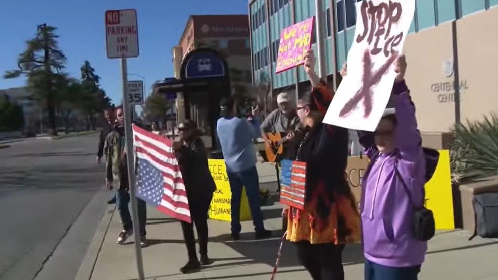 Musicians and community members gathered in front of the ICE field office in downtown Bakersfield Friday afternoon, calling for "legality, humanity, and transparency." PHOTO: KBAK/KBFX
