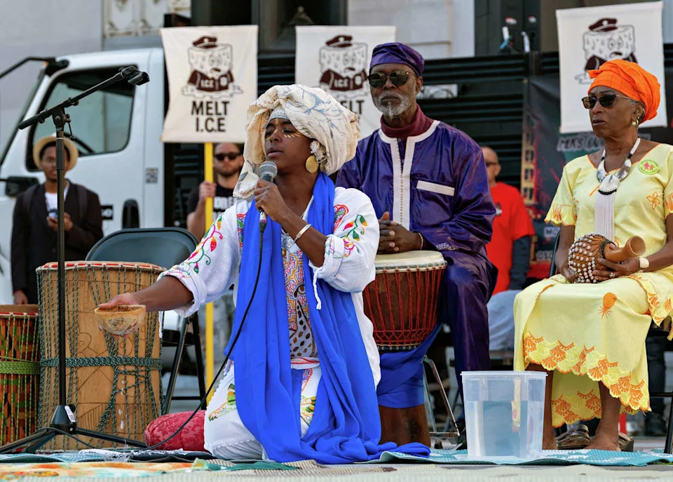 Members of Auspicious Acoustics perform a ritual before a Martin Luther King Jr. Day march organized by the Anti Police-Terror Project in Oakland on Monday. (Jungho Kim/For the S.F. Chronicle)