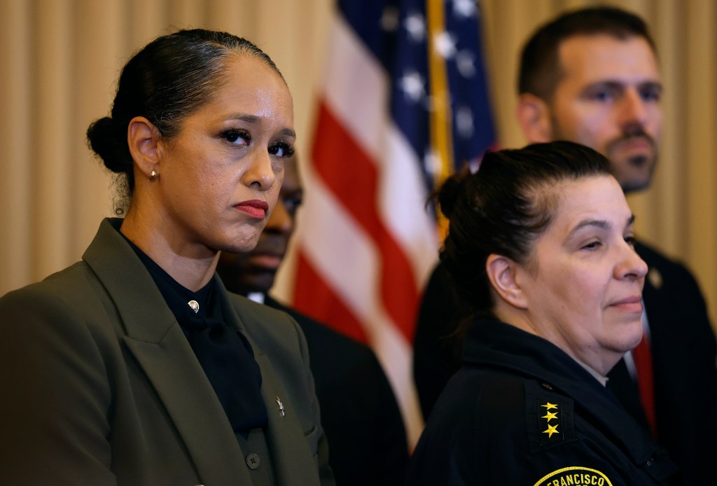 San Francisco District Attorney Brooke Jenkins looks on during a press conference with San Francisco Mayor Daniel Lurie.