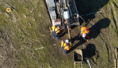 A drone view of California Department of Water Resources’s Sustainable Groundwater Management Office installing new equipment to enhance the monitoring and understanding of land subsidence in California.  The newly installed GPS station and remote sensing calibration equipment will be firmly anchored into the ground to ensure precise positioning and detect vertical movement of the Earth’s surface. Photo taken January 16, 2025.