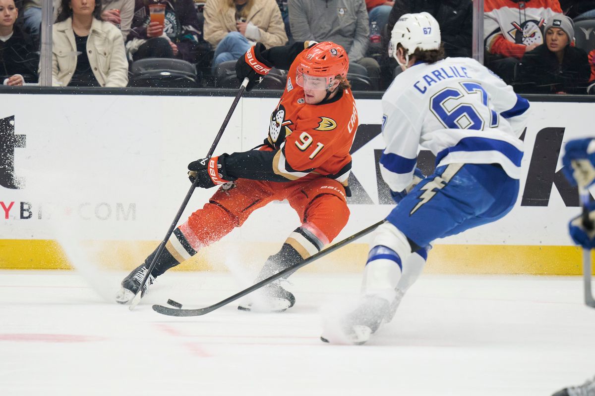 Anaheim Ducks center Leo Carlsson (91) gains control of the puck against the Lightning at the Honda Center on December 31,2025 in Anaheim, California.