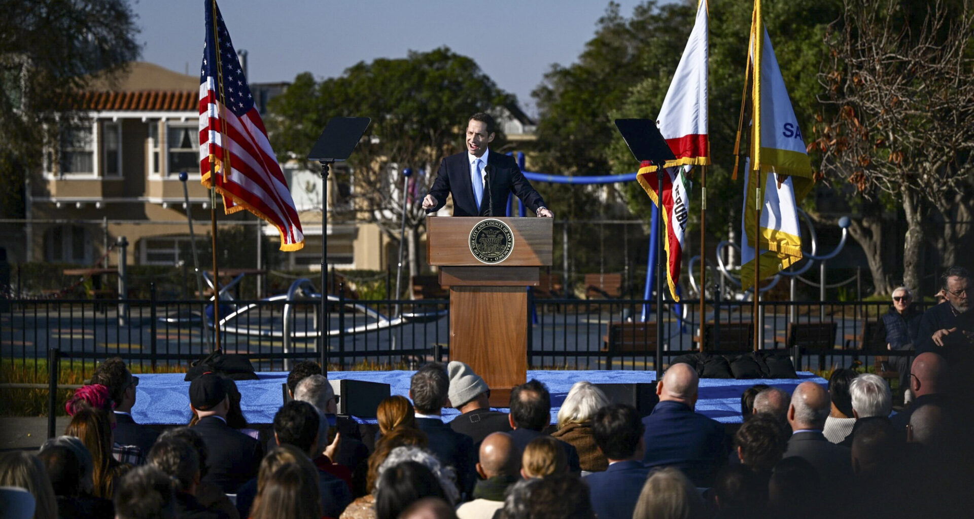 San Francisco Mayor Daniel Lurie gives remarks during a State of the City address at Rossi Park Ball Field in the Richmond neighborhood of San Francisco on Jan. 15, 2026. Beth LaBerge/KQED