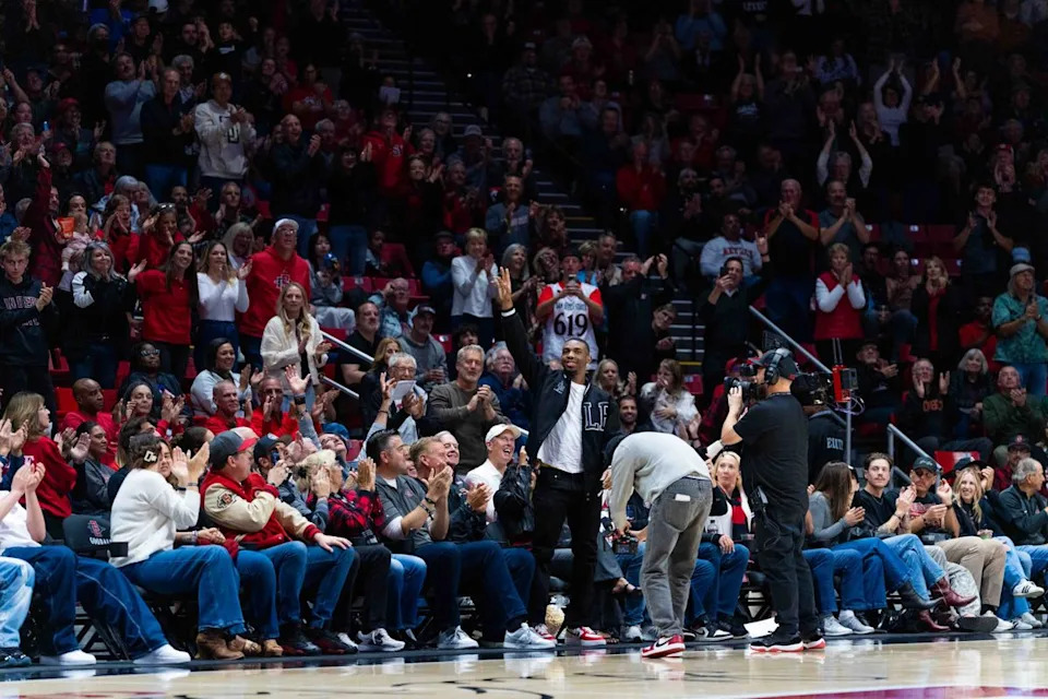 Former Aztec Lamont Butler waves to the crowd during an NCAA Basketball game between Colorado State and San Diego State, Wednesday January 28, 2026 at Viejas Arena in San Diego, Calif.