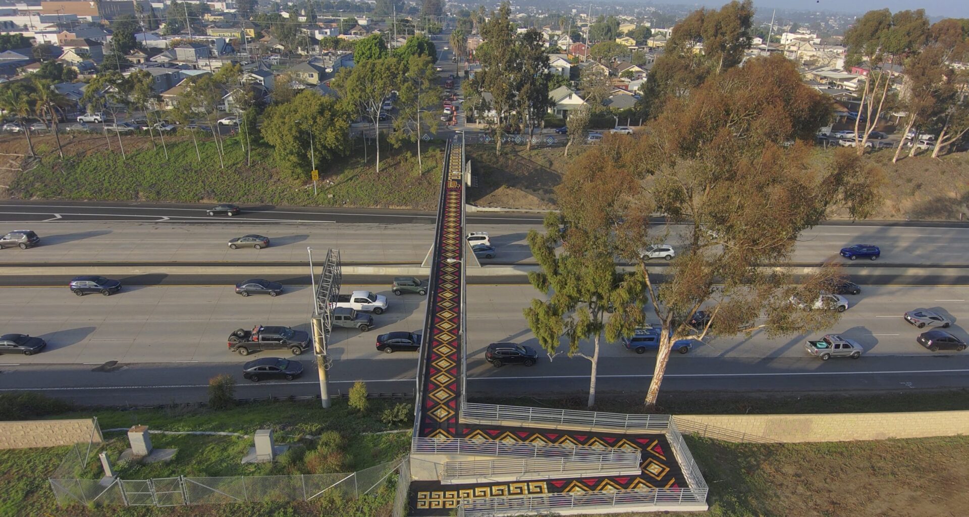 Mural over Barrio Logan-Logan Heights bridge shows 'people from this city can actually add art to this city'