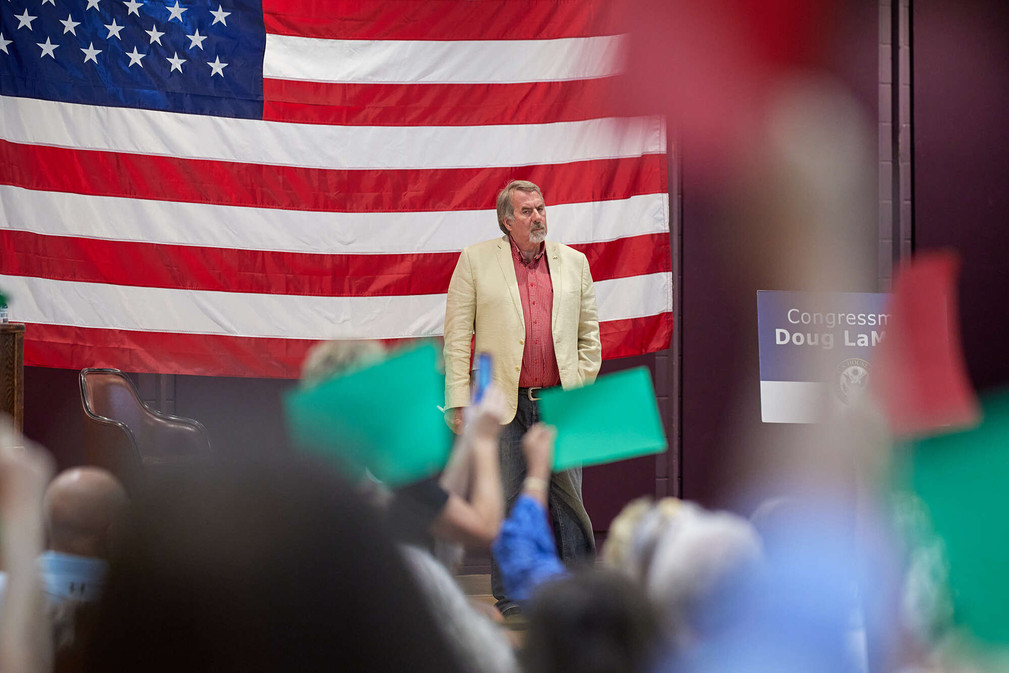 U.S. Rep. Doug LaMalfa listens to a comment from an...