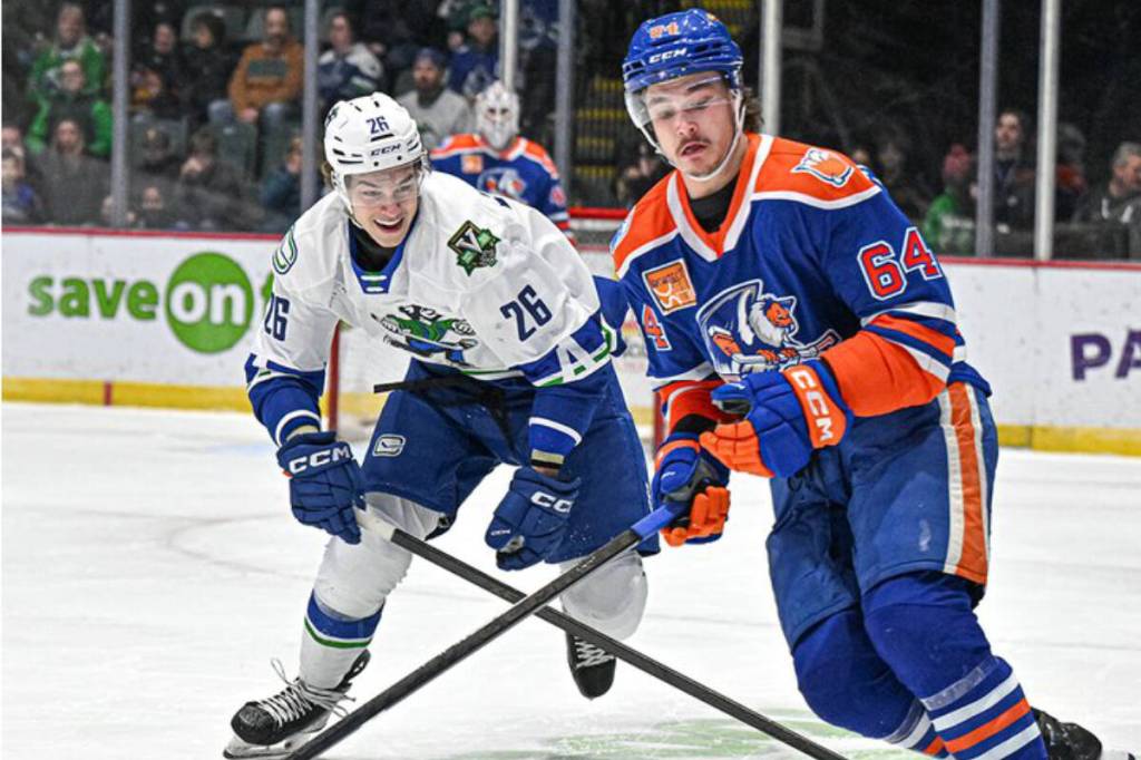 Abbotsford&rsquo;s Anri Ravinskis chases down the puck against the Bakersfield Condors on Wednesday (Jan. 7). (Abbotsford Canucks photo)