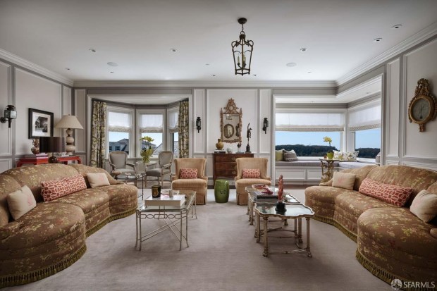 Living room with antique lantern chandelier.