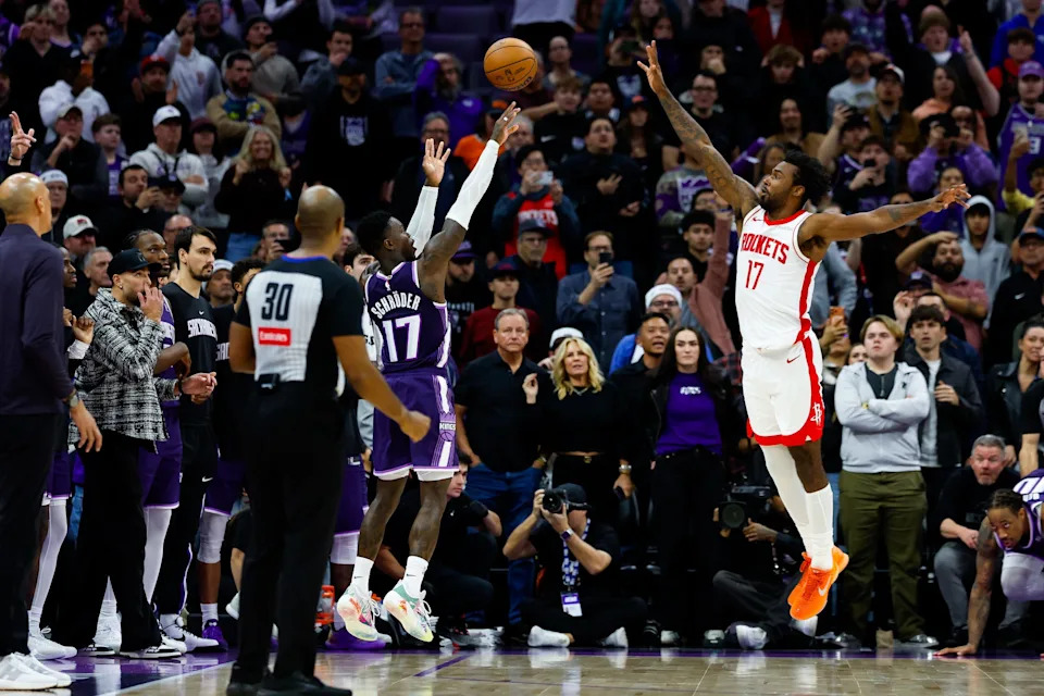 Dec 21, 2025; Sacramento, California, USA; Sacramento Kings guard Dennis Schroder (17) scores a basket in overtime against the Houston Rockets at Golden 1 Center. Mandatory Credit: Sergio Estrada-Imagn Images