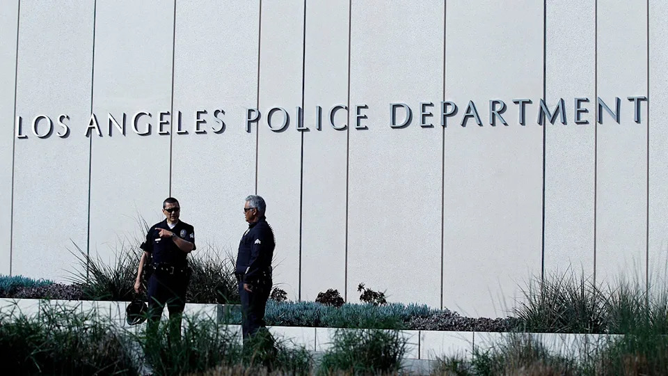 Police officers patrol outside LAPD headquarters in Los Angeles, California