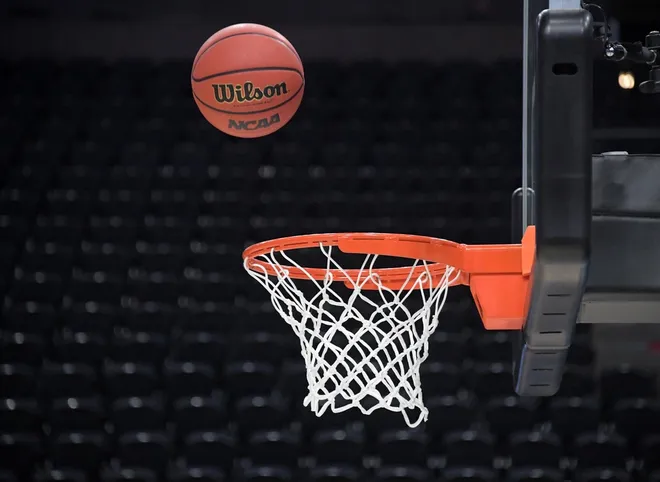 Mar 20, 2019; Salt Lake City, UT, USA; General overall view of a basketball approaching the rim and net before the first round of the 2019 NCAA Tournament at Vivint Smart Home Arena.