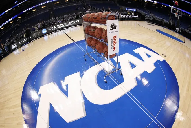 Mar 20, 2014; Orlando, FL, USA; General view of basketballs on the NCAA logo prior to a men's college basketball game between the Colorado Buffaloes and Pittsburgh Panthers during the second round of the 2014 NCAA Tournament at Amway Center.