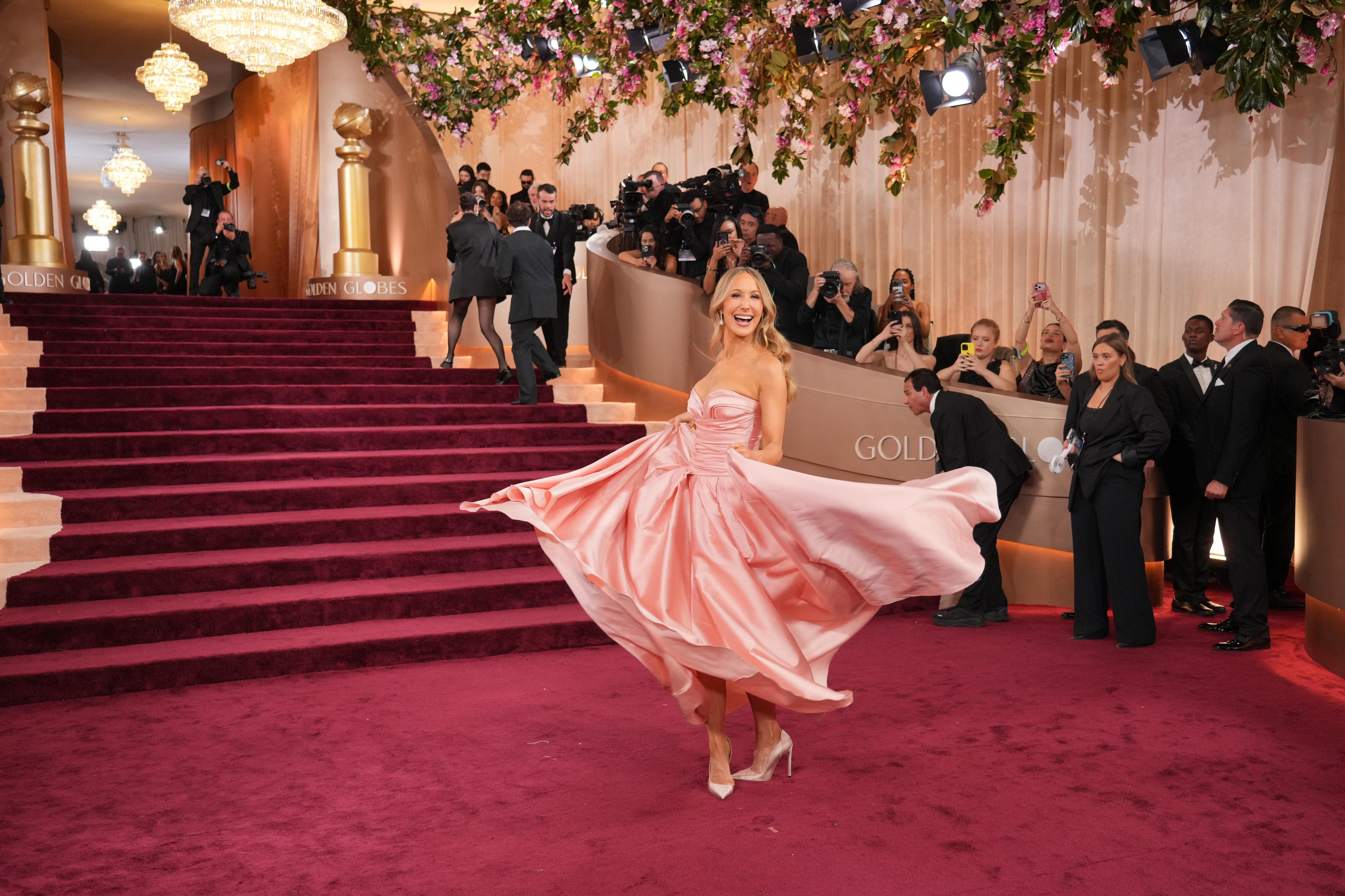 Nikki Glaser arrives at the 83rd Golden Globes on Sunday,...
