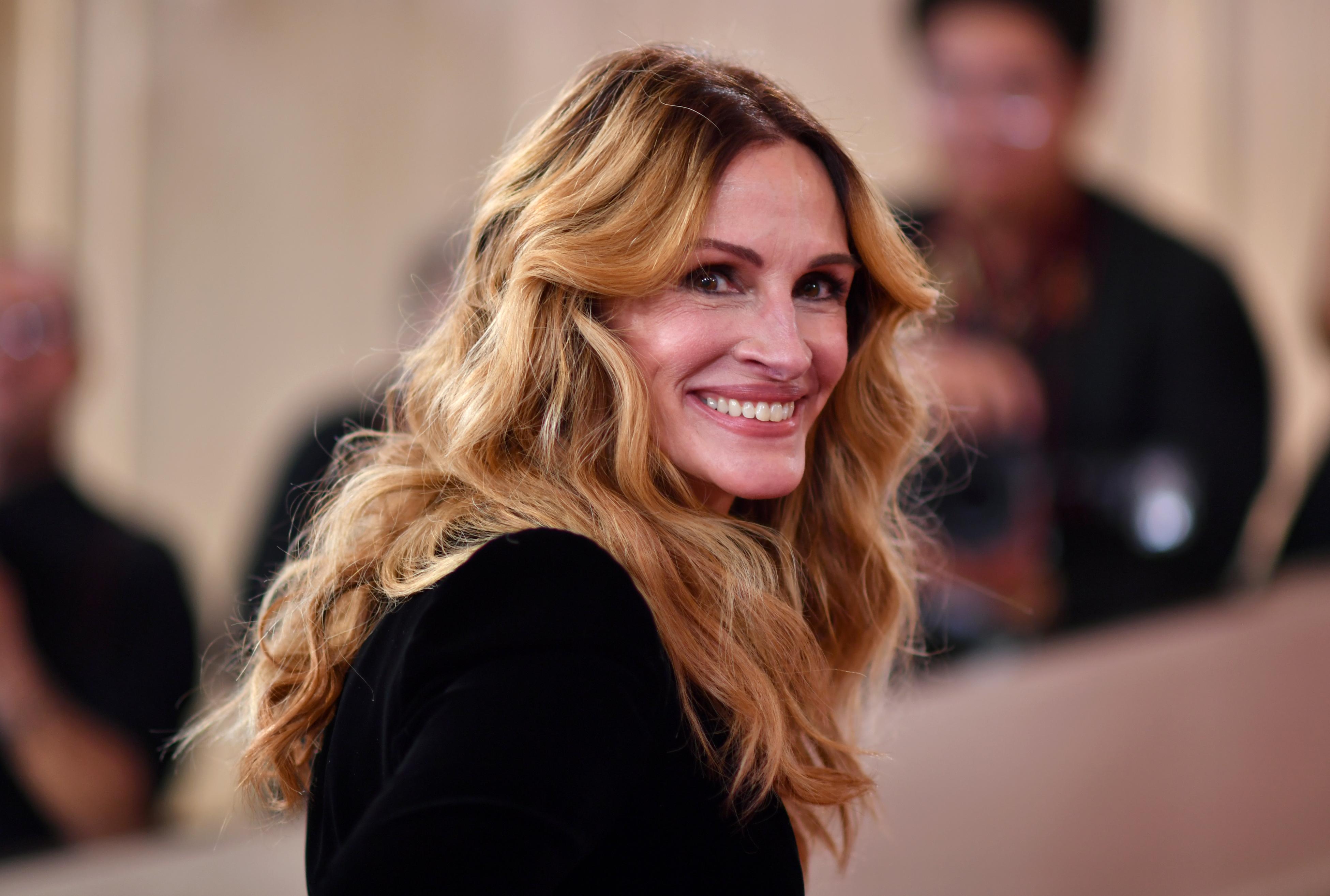 Julia Roberts arrives at the 83rd Golden Globes on Sunday,...