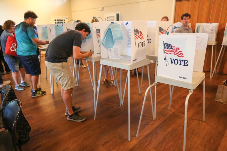 Voters cast their ballots at St. Timothy's Episcopal Church in Mountain View on March 3. Photo by Sammy Dallal.