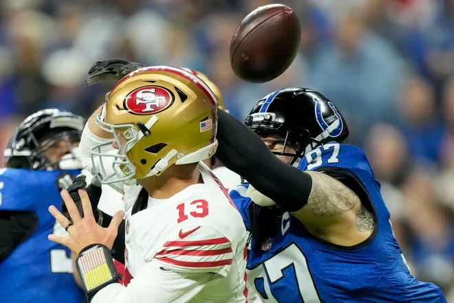 Indianapolis Colts defensive end Laiatu Latu (97) disrupts a pass by San Francisco 49ers quarterback Brock Purdy (13) on Monday, Dec. 22, 2025, during a game at Lucas Oil Stadium in Indianapolis.