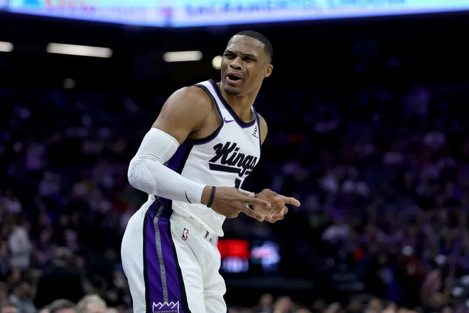 Jan 1, 2026; Sacramento, California, USA; Sacramento Kings guard Russel Westbrook (18) reacts towards the Boston Celtics bench after making a basket during the third quarter at Golden 1 Center.