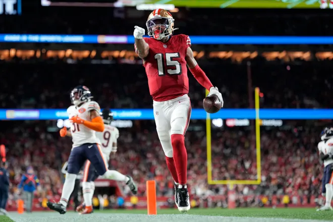Dec 28, 2025; Santa Clara, California, USA; San Francisco 49ers wide receiver Jauan Jennings (15) runs to score a touchdown against the Chicago Bears in the second half at Levi's Stadium. Mandatory Credit: Kyle Terada-Imagn Images