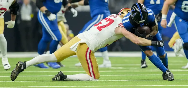 San Francisco 49ers linebacker Luke Gifford (57) tackles Indianapolis Colts wide receiver Josh Downs (2) on Monday, Dec. 22, 2025, during a game against the San Francisco 49ers at Lucas Oil Stadium in Indianapolis.