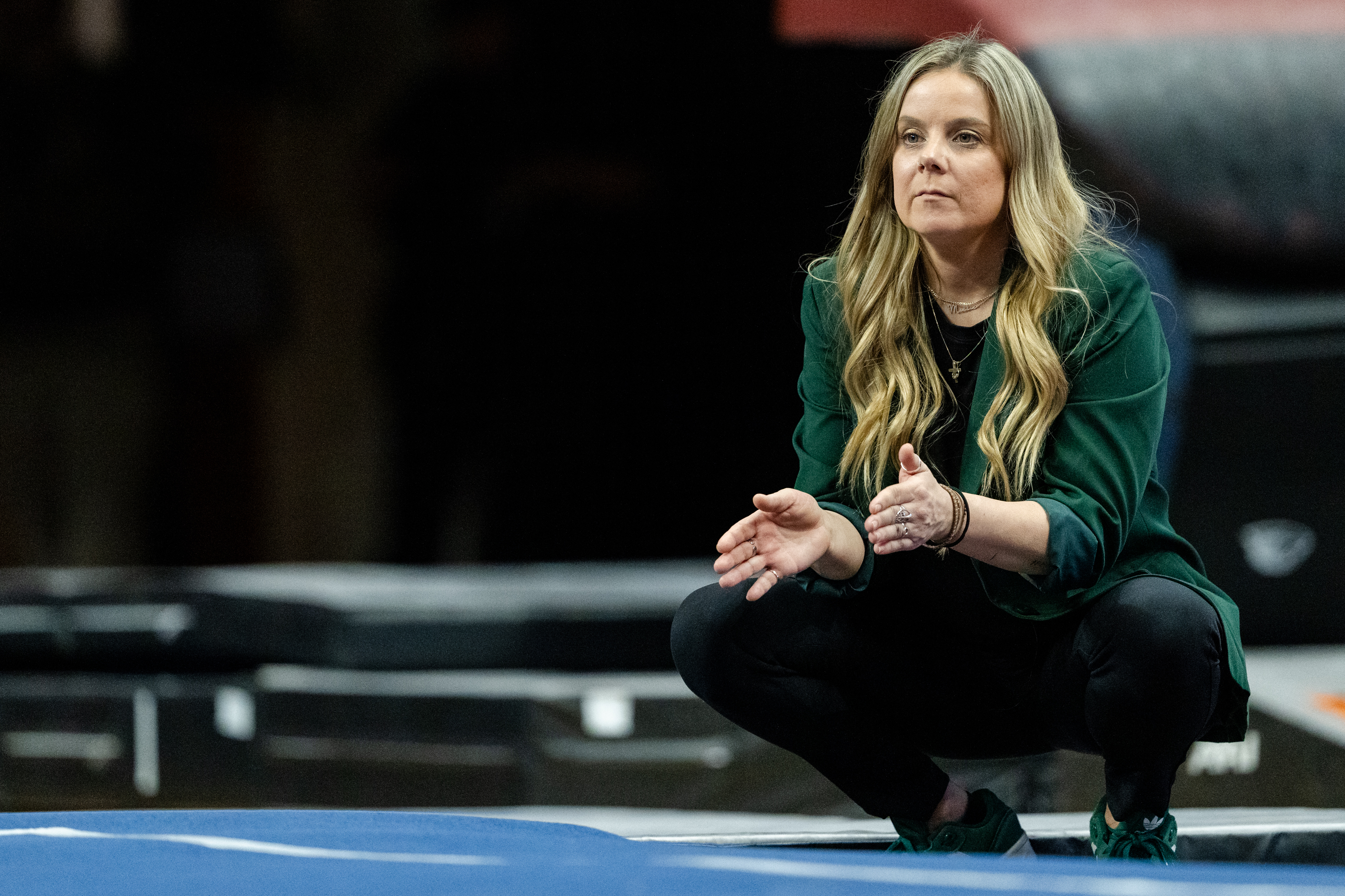 Head Coach Melissa Genovese of the Sacramento State Hornets looks on during a floor routine in the third rotation of a gymnastics meet  against the Oregon State Beavers at Gill Coliseum on January 16, 2026 in Corvallis, OR.