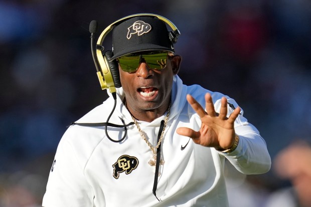 Colorado head coach Deion Sanders shouts at an official during the first half of an NCAA college football game against Arizona State, Saturday, Oct. 7, 2023, in Tempe, Ariz. (AP Photo/Ross D. Franklin)