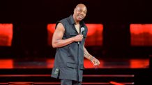 FILE - Comedian Dave Chappelle performs at Madison Square Garden during his 50th birthday celebration week, in New York, Aug. 22, 2023. 