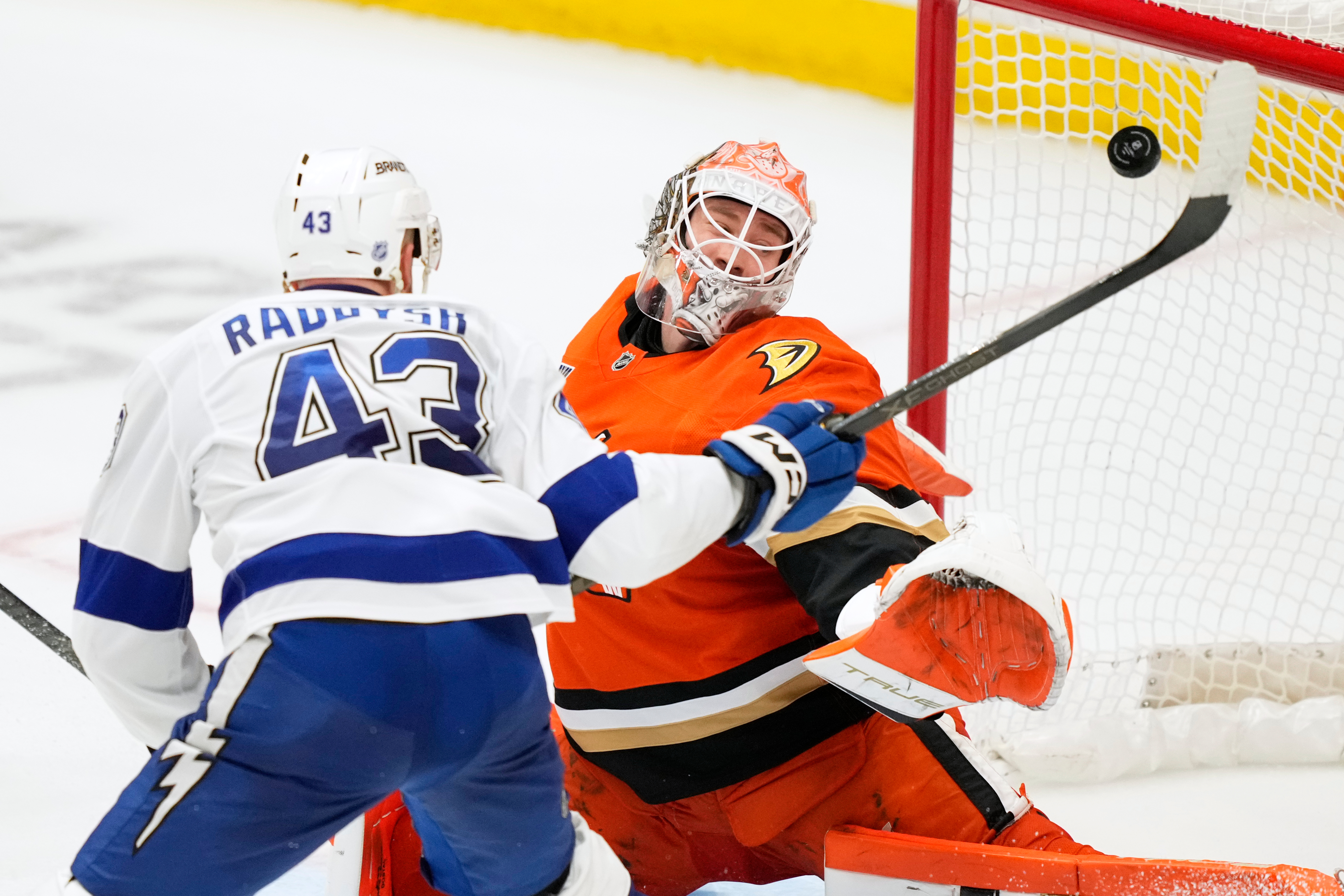 Tampa Bay Lightning defenseman Darren Raddysh, left, scores the game-winning...
