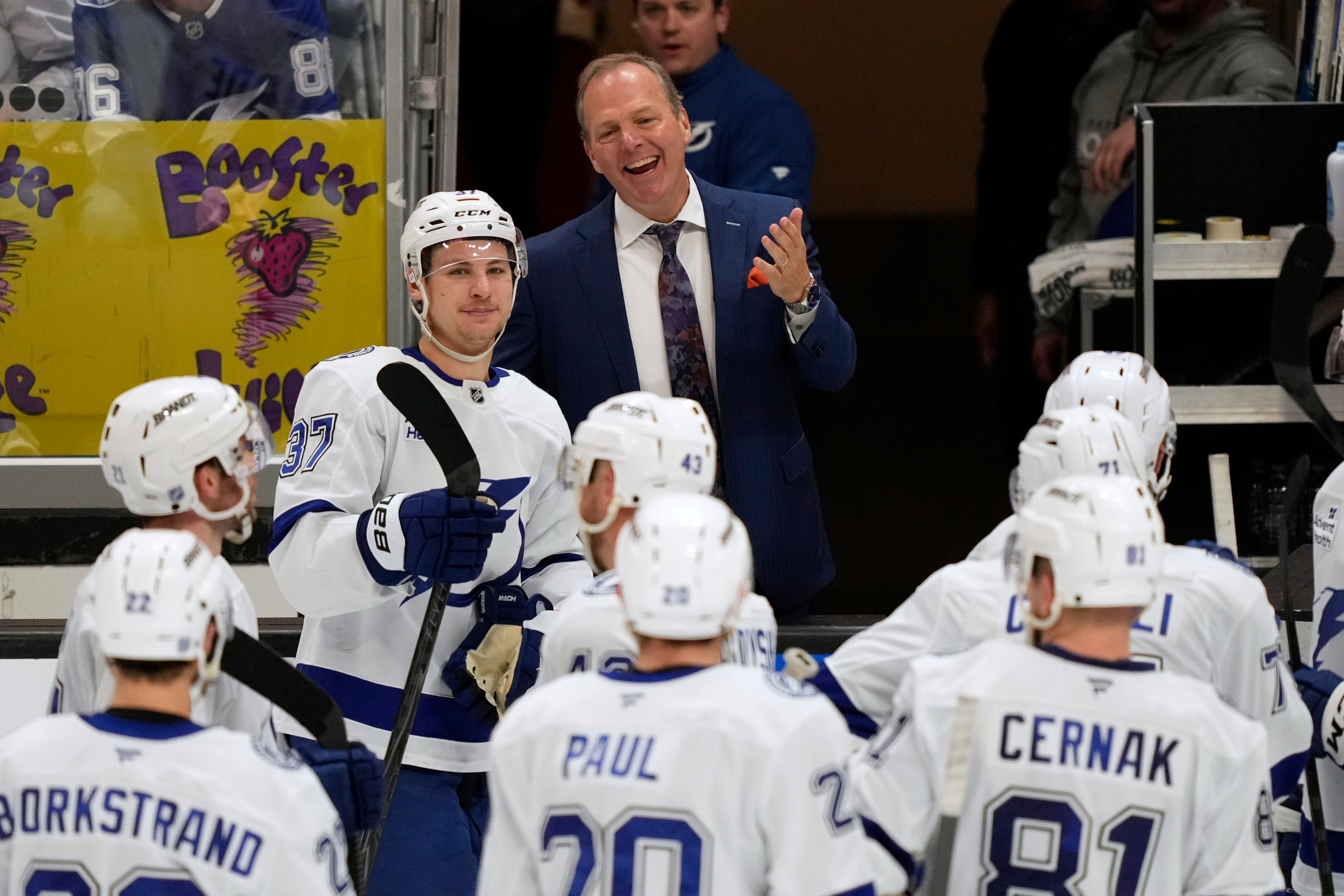 Tampa Bay Lightning head coach Jon Cooper, top, celebrates with...