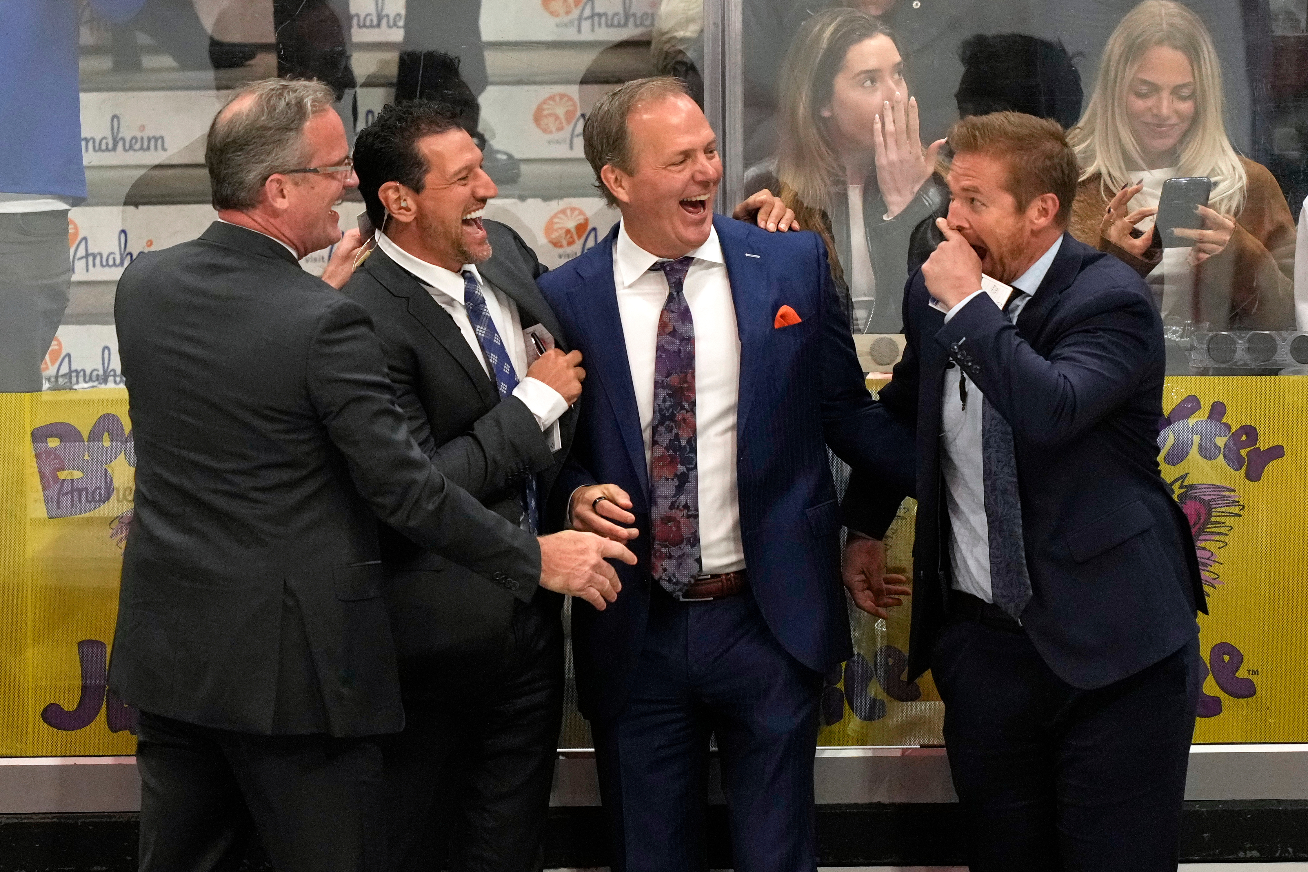 Tampa Bay Lightning head coach Jon Cooper, second from right,...