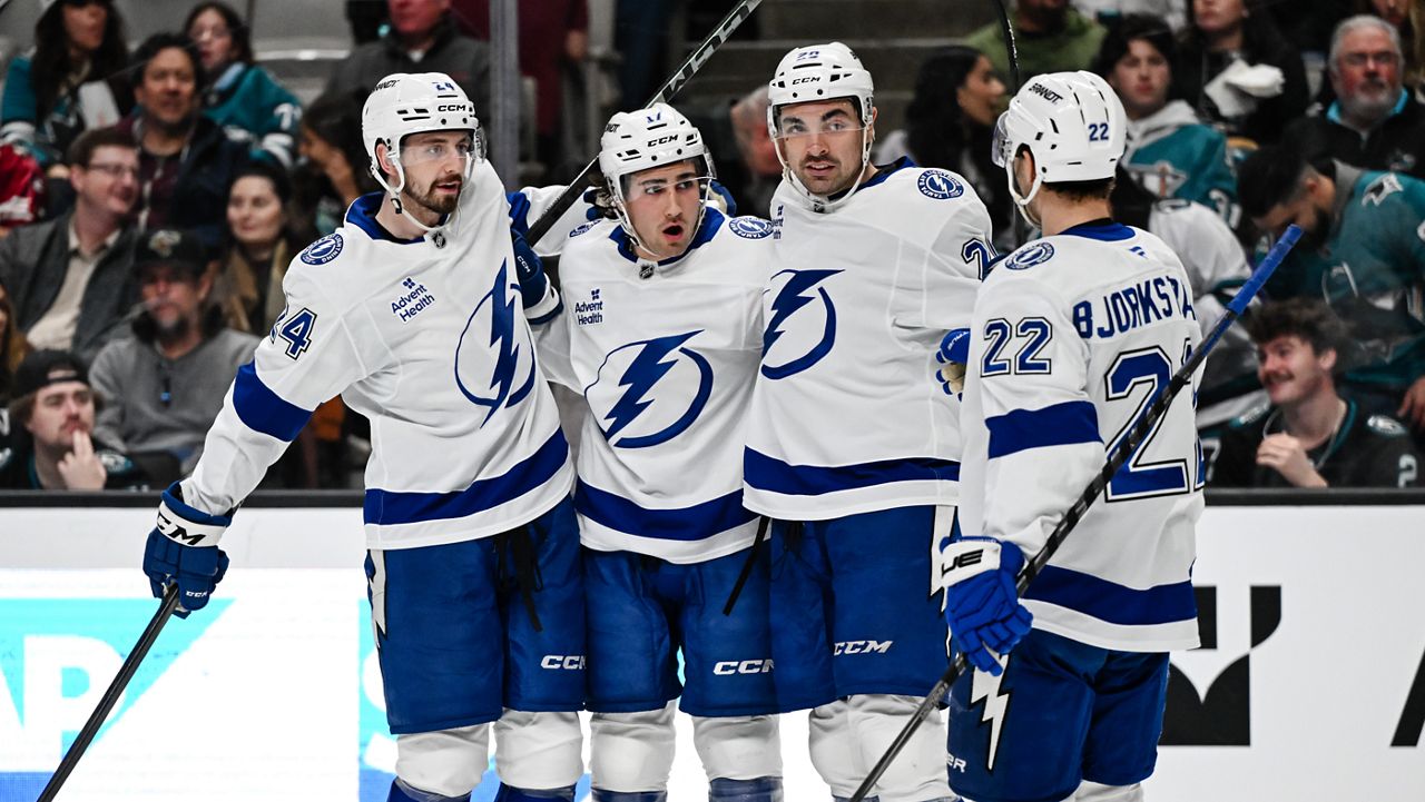 Tampa Bay Lightning center Dominic James (17), middle left, celebrates after scoring a goal against the San Jose Sharks during the second period of an NHL hockey game Saturday, Jan. 3, 2026, in San Jose, Calif. (AP Photo/Thien-An Truong)