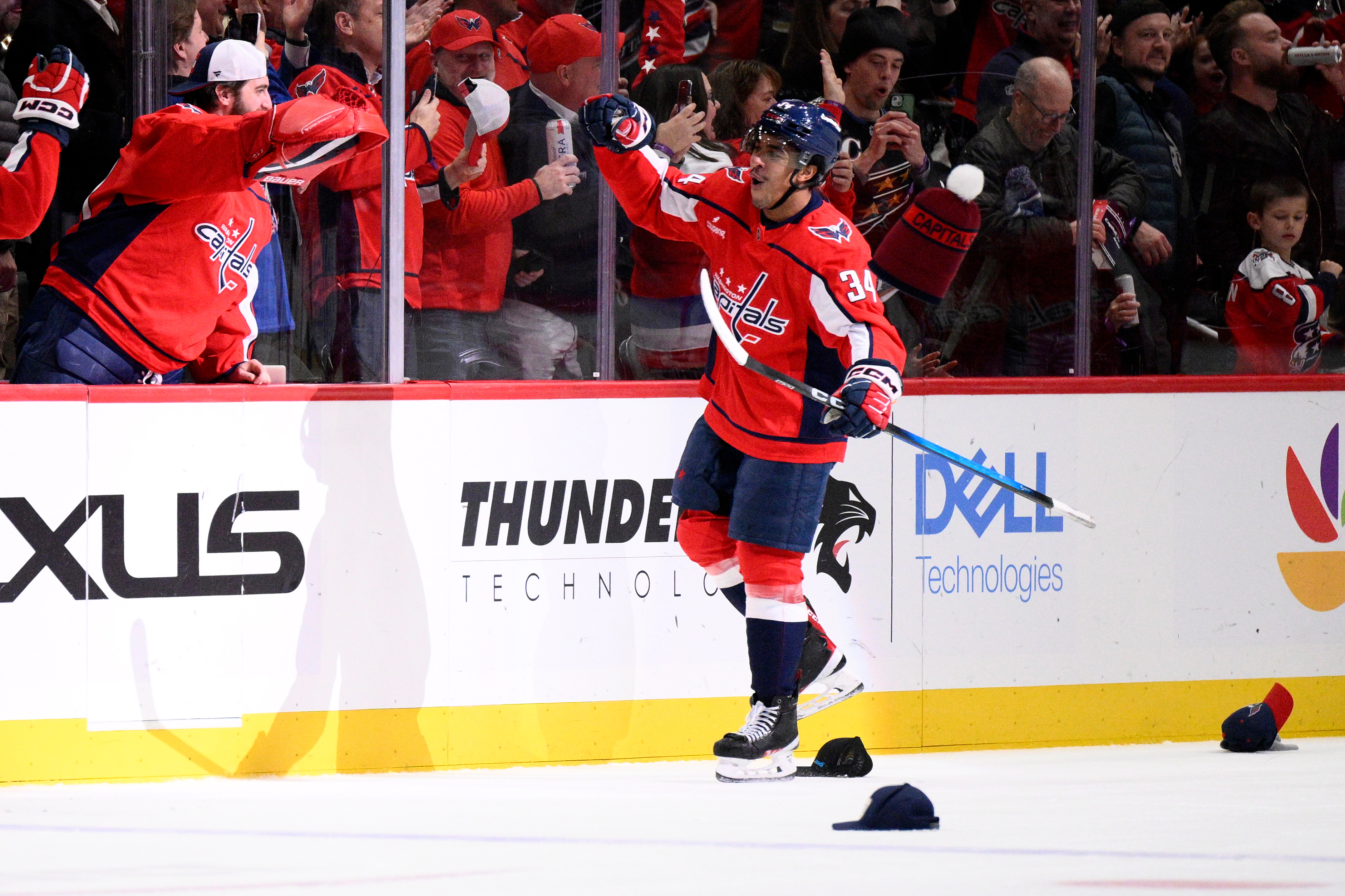 Washington Capitals right wing Justin Sourdif celebrates after scoring his...