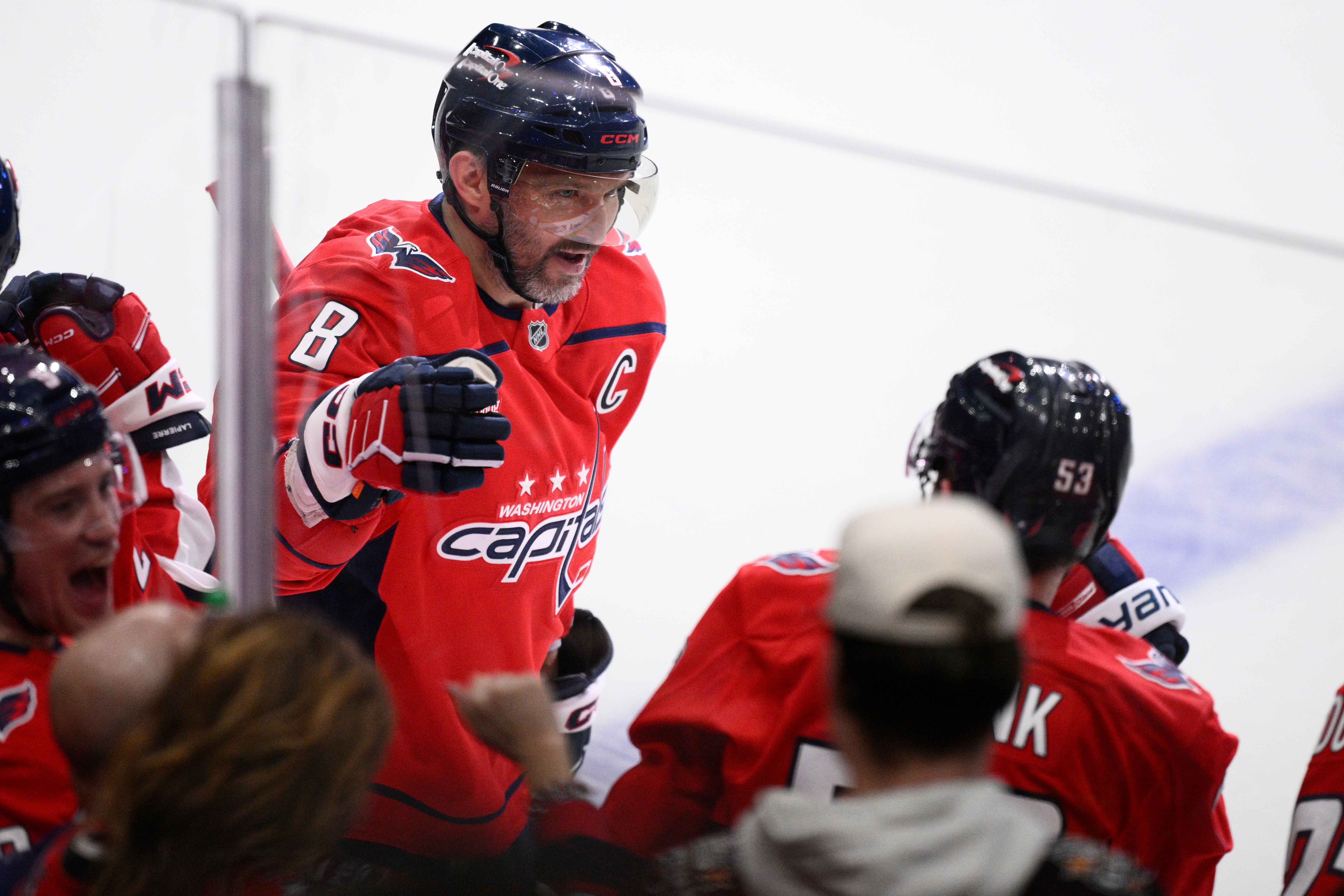 Washington Capitals left wing Alex Ovechkin, left, celebrates after scoring...