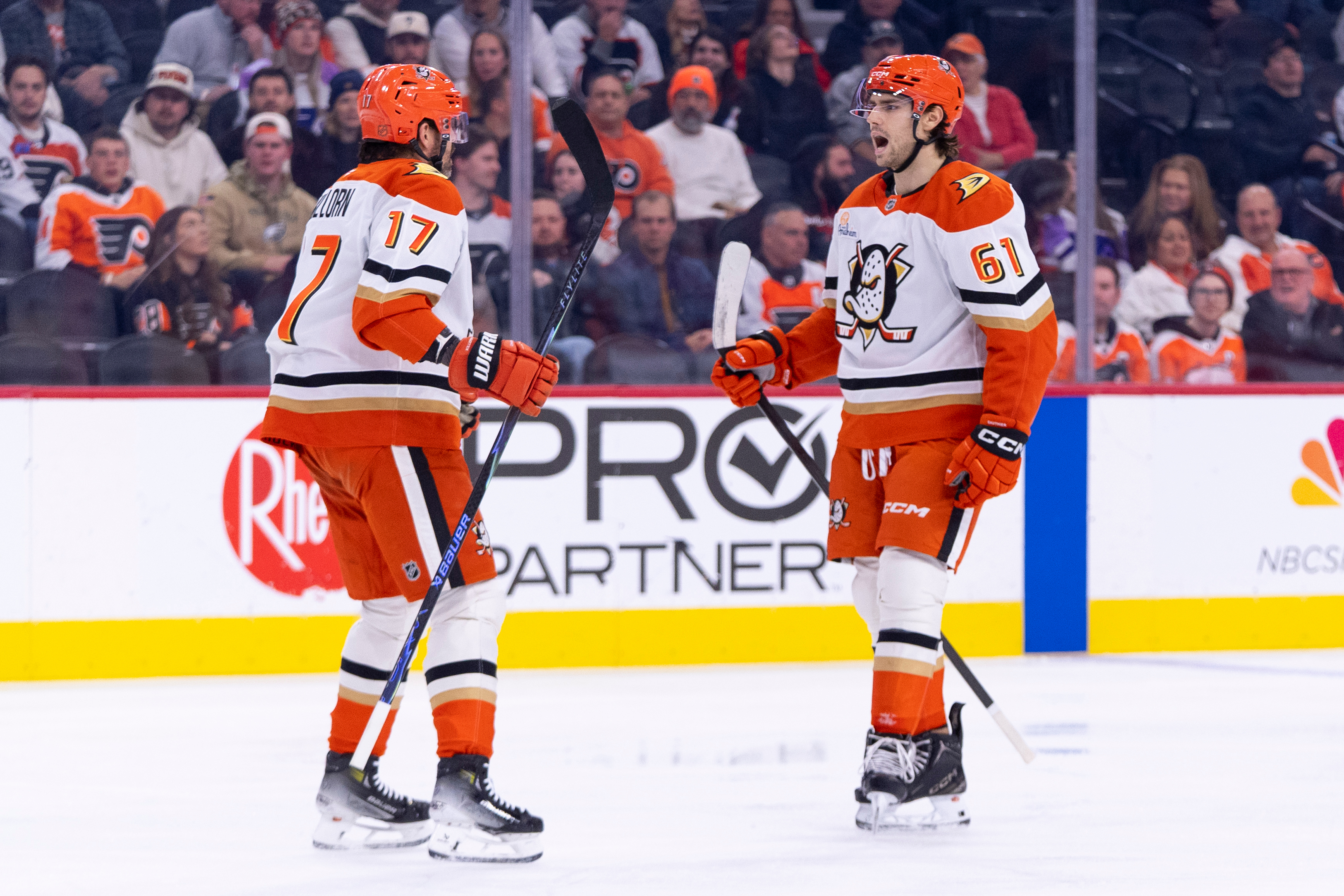 The Ducks’ Cutter Gauthier, right, reacts to his goal with...