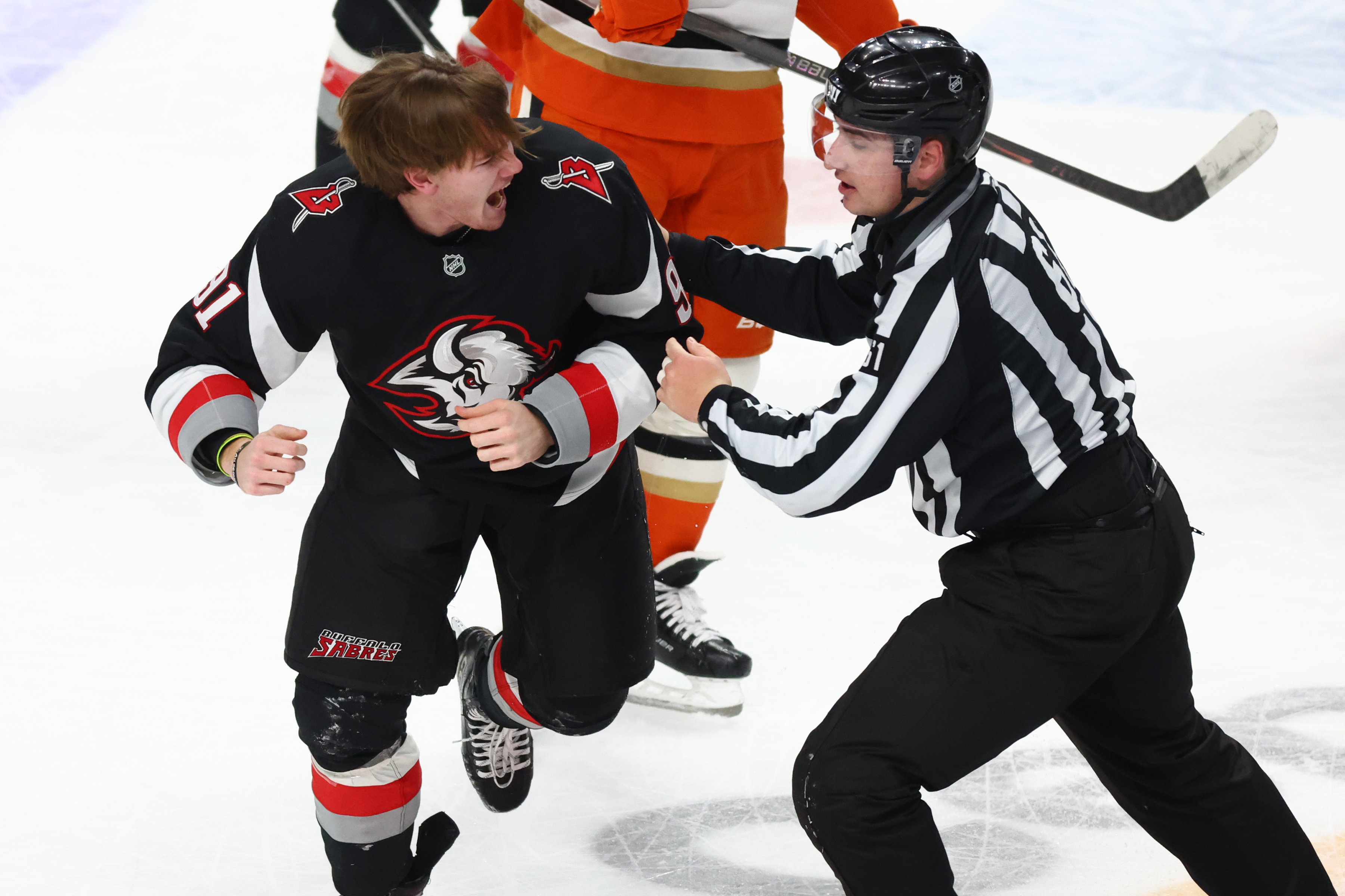 Buffalo Sabres right wing Josh Doan reacts after a fight...