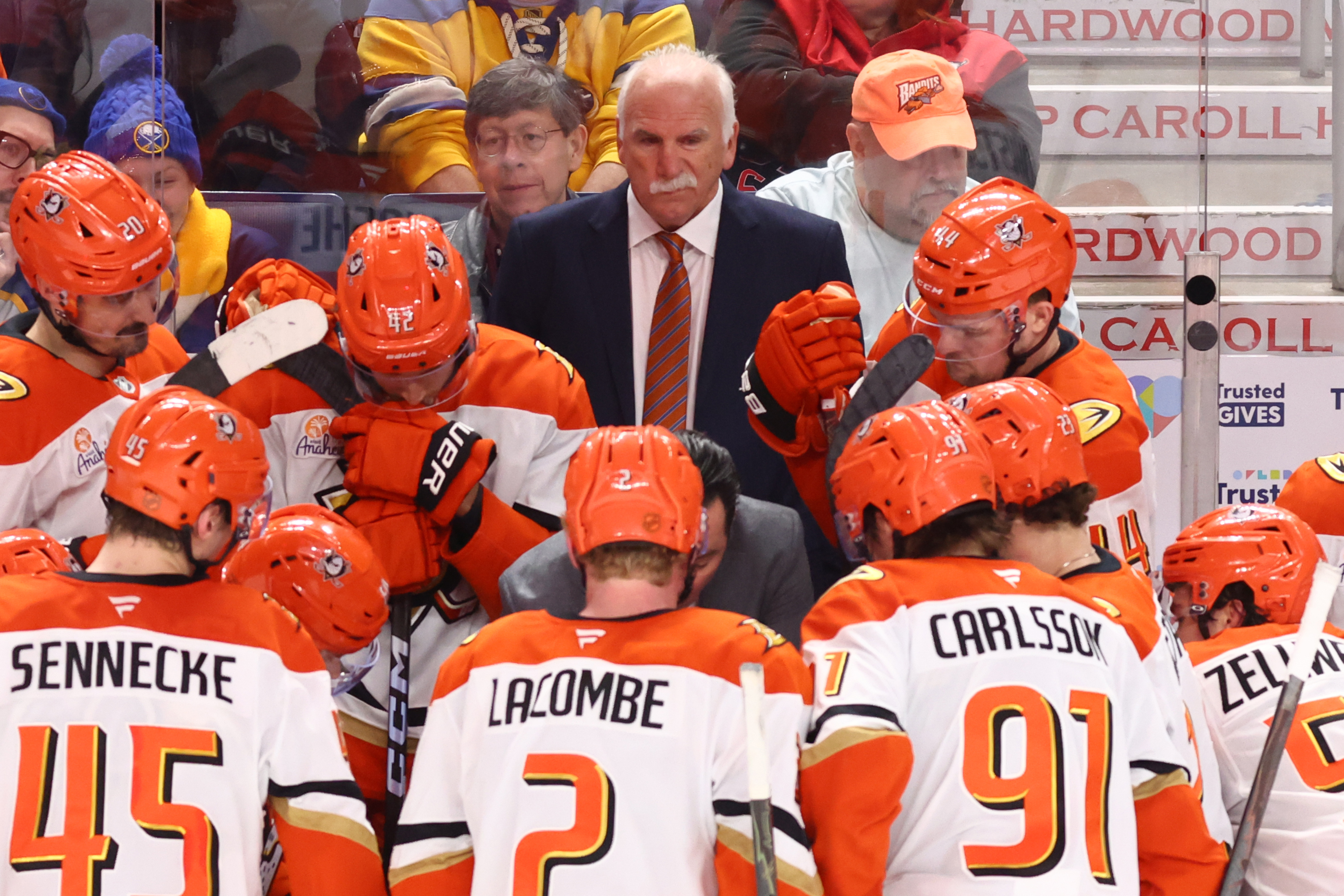 Ducks head coach Joel Quenneville, center top, looks on during...
