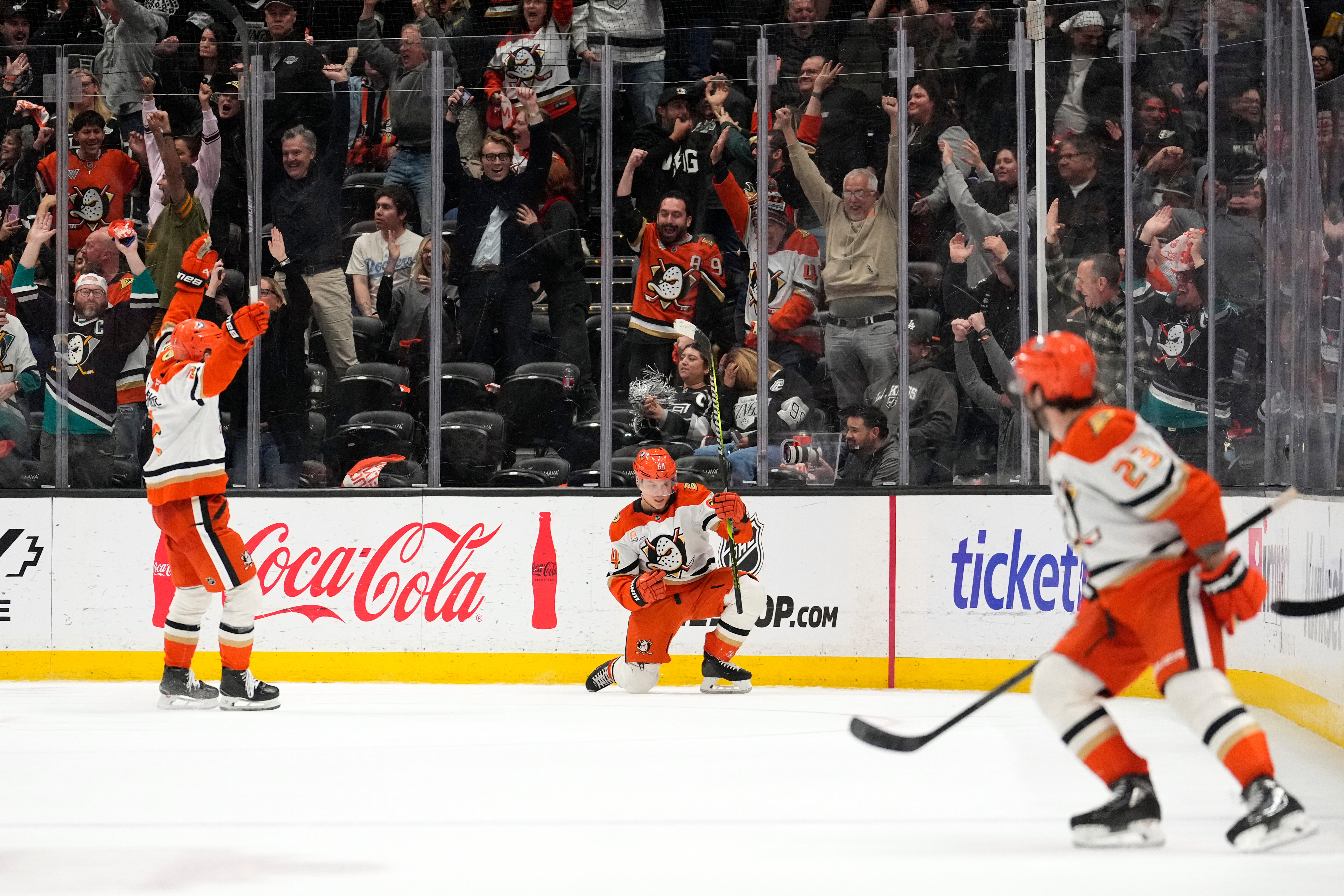 Ducks center Mikael Granlund, center, celebrates his game-winning goal along...