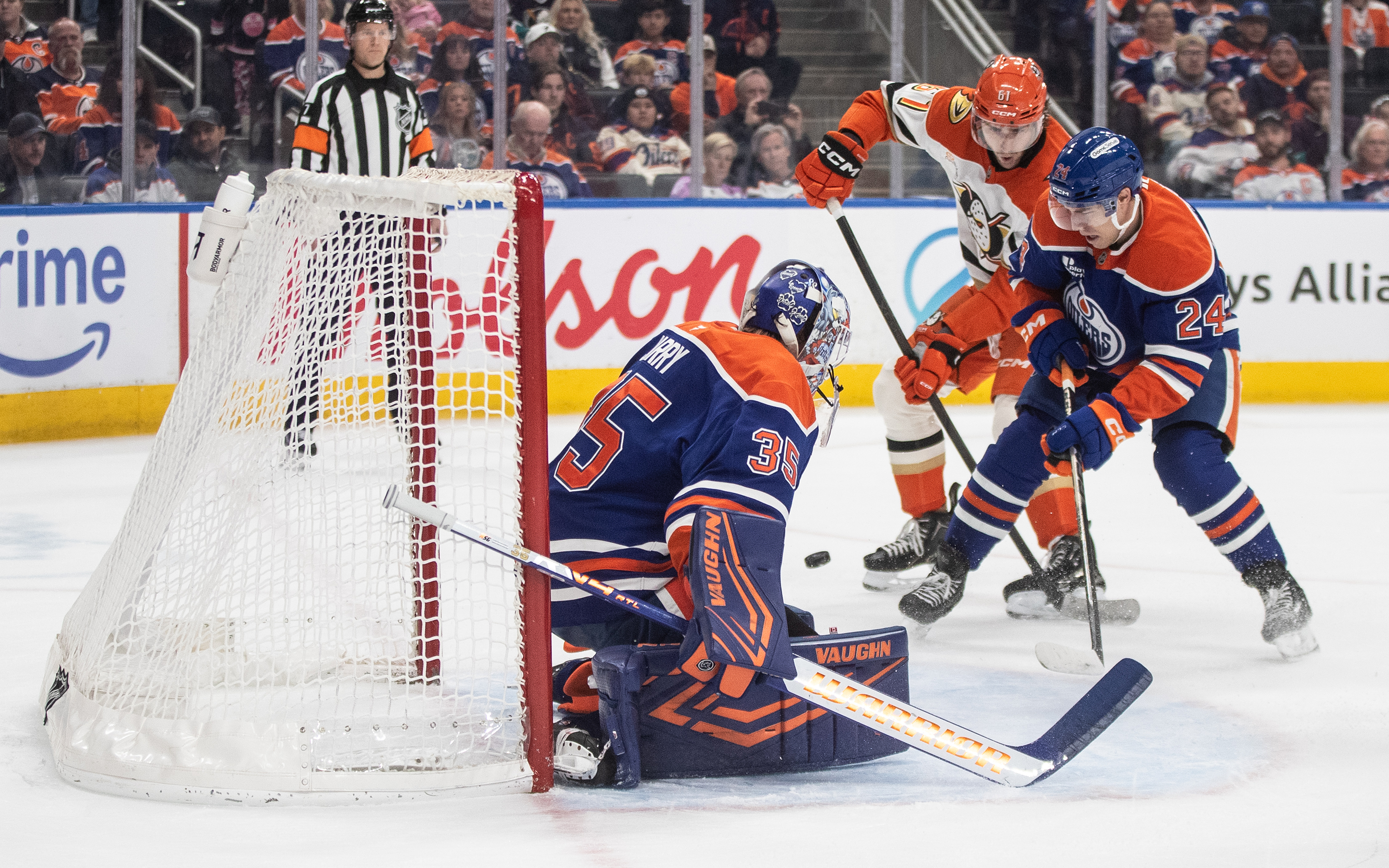 The Ducks’ Cutter Gauthier (61) and the Edmonton Oilers’ Spencer...