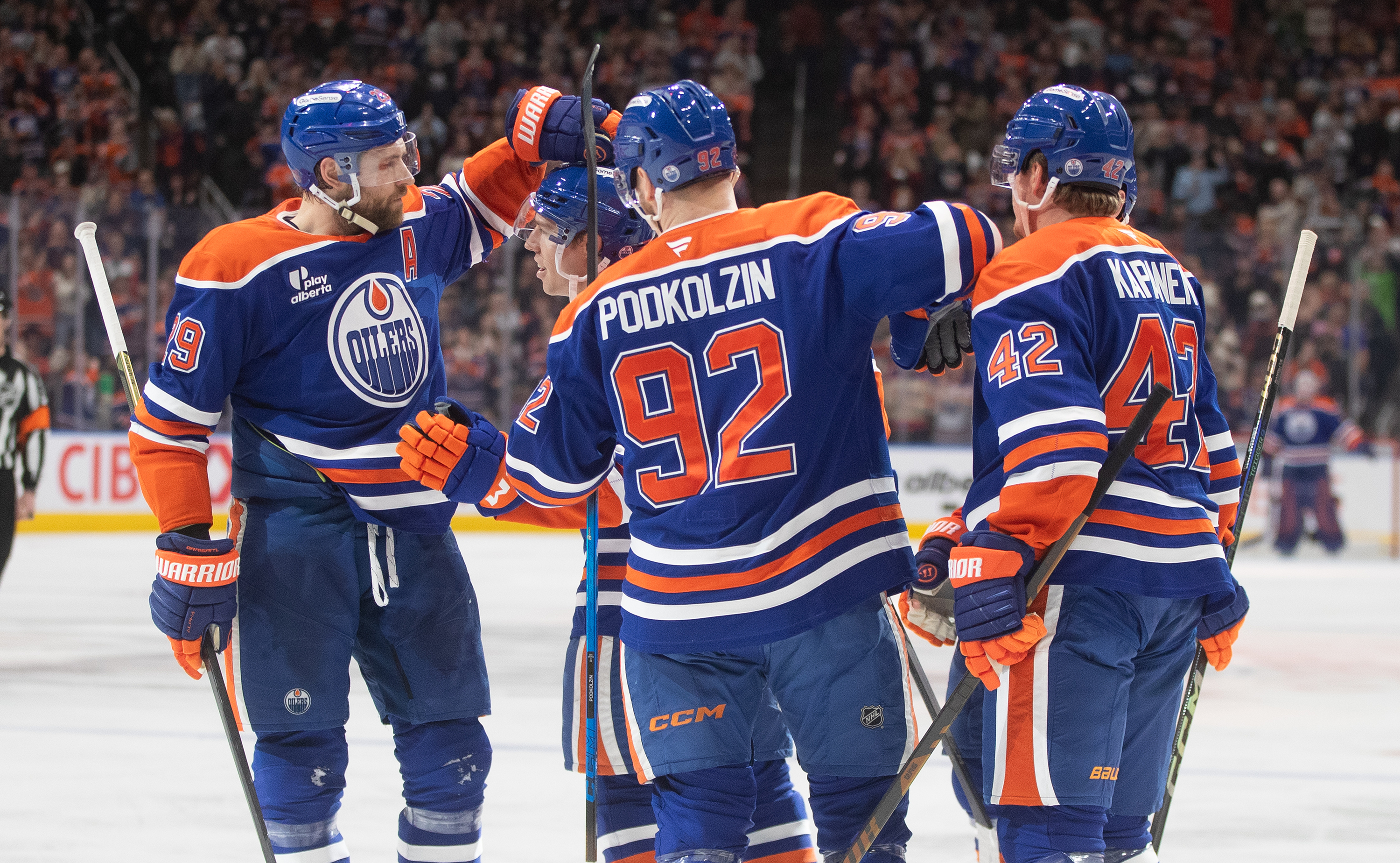 The Edmonton Oilers’ Spencer Stastney, second from left, celebrates after...