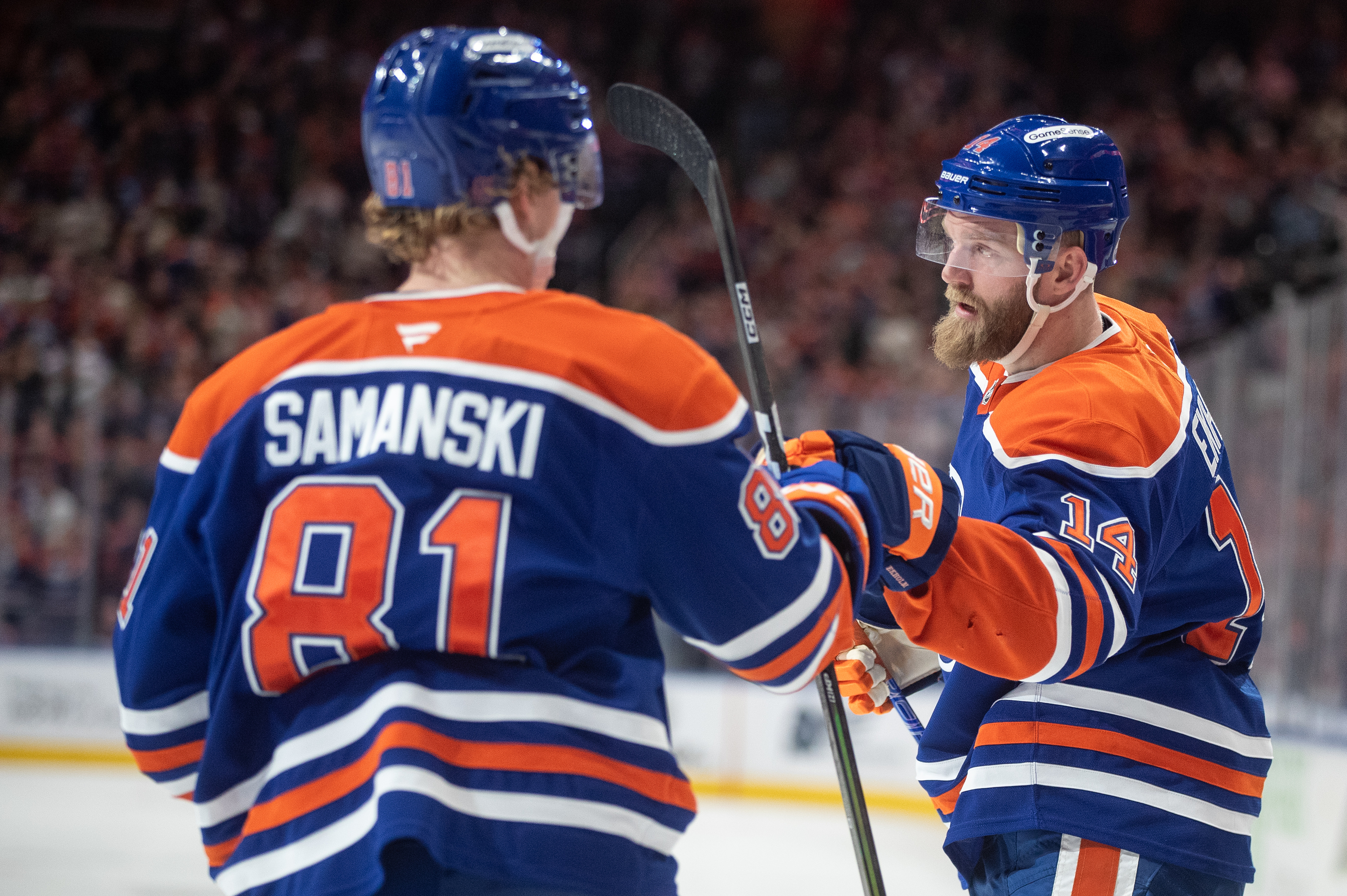 The Edmonton Oilers’ Mattias Ekholm, right, celebrates with teammate Josh...