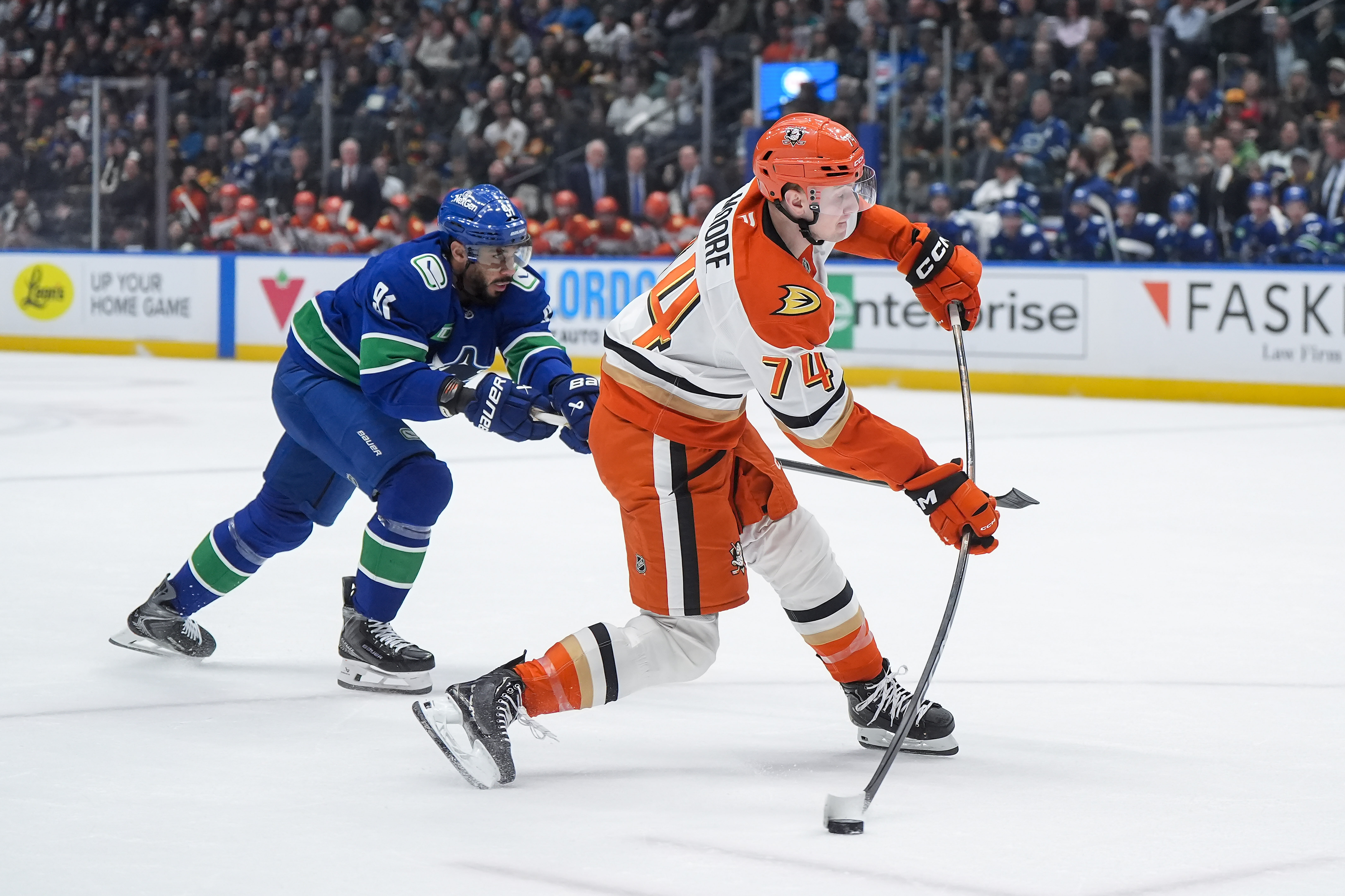 The Ducks’ Ian Moore takes a shot on goal while...