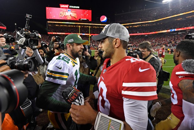 SANTA CLARA, CA - JANUARY 19: Green Bay Packers quarterback Aaron Rodgers (12) congratulates San Francisco 49ers' quarterback Jimmy Garoppolo (10) after winning the NFC Championship game at Levi's Stadium in Santa Clara, Calif., on Sunday, Jan. 19, 2020. The San Francisco 49ers defeated the Green Bay Packers 37-20. (Jose Carlos Fajardo/Bay Area News Group)