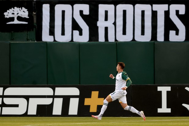 Oakland Roots' Justin Rasmussen (14) celebrates his goal against the San Antonio FC during the first half of the home opener of a USL soccer match at the Oakland-Alameda County Coliseum in Oakland, Calif., on Saturday, March 22, 2025. (Ray Chavez/Bay Area News Group)