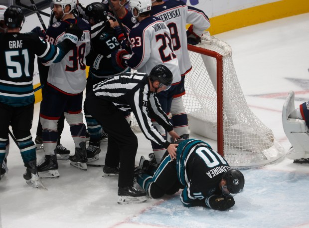 San Jose Sharks' Ty Dellandrea (10) kneels on the ice after being injured against the Columbus Blue Jackets in the second period at the SAP Center in San Jose, Calif., on Tuesday, Jan. 6, 2026. (Nhat V. Meyer/Bay Area News Group)