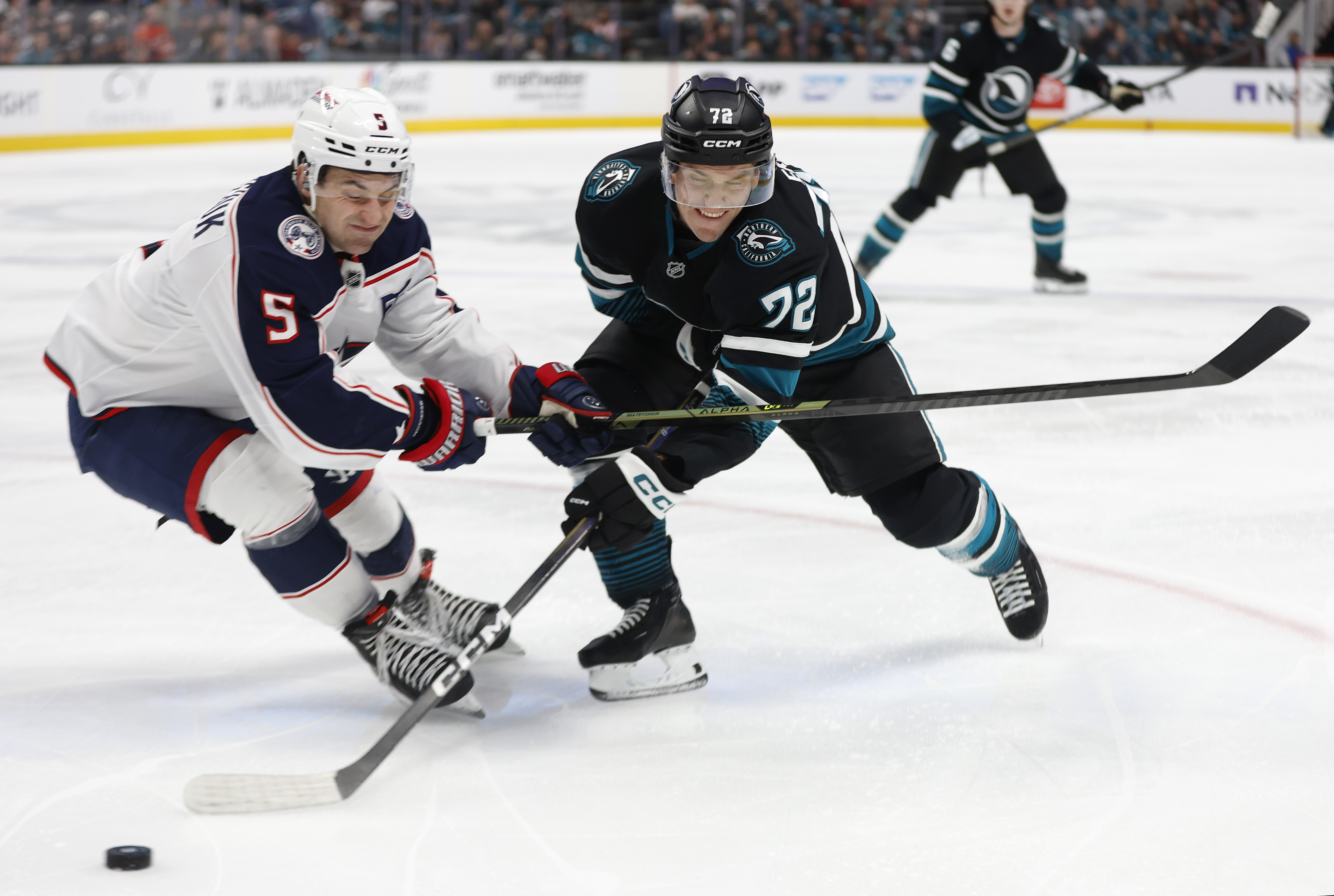 San Jose Sharks' William Eklund (72) passes the puck against...