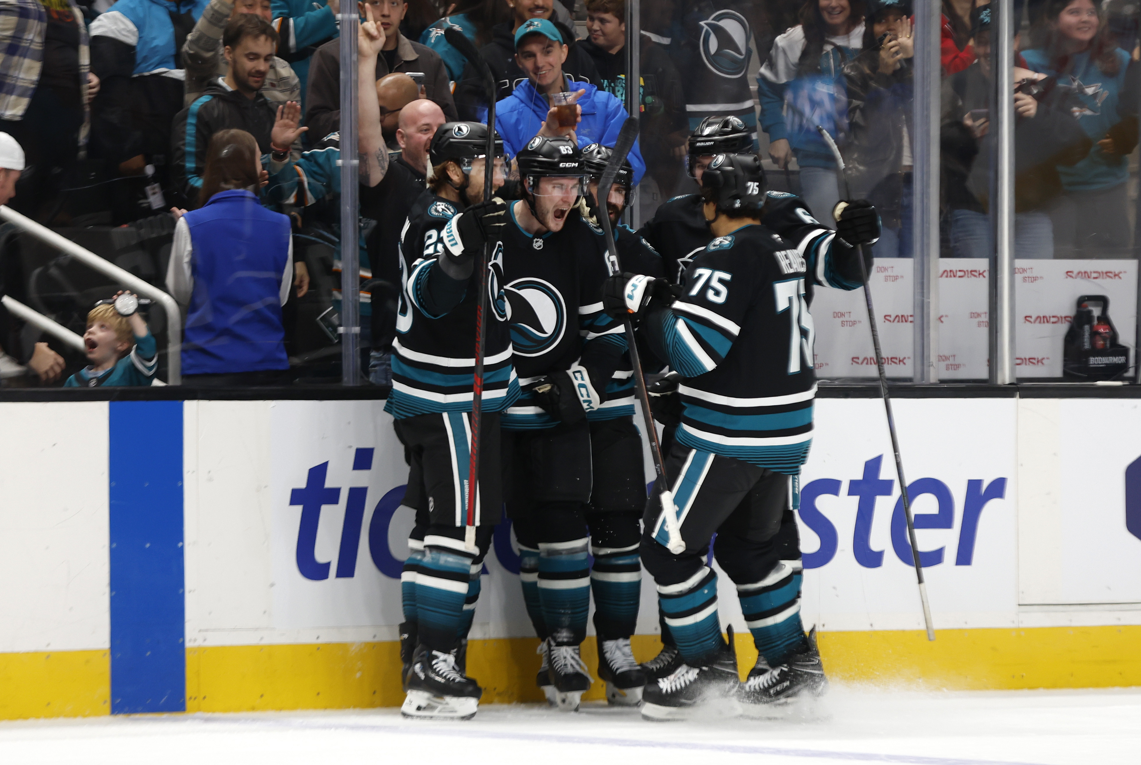 San Jose Sharks' Zack Ostapchuk (63) celebrates his goal against...
