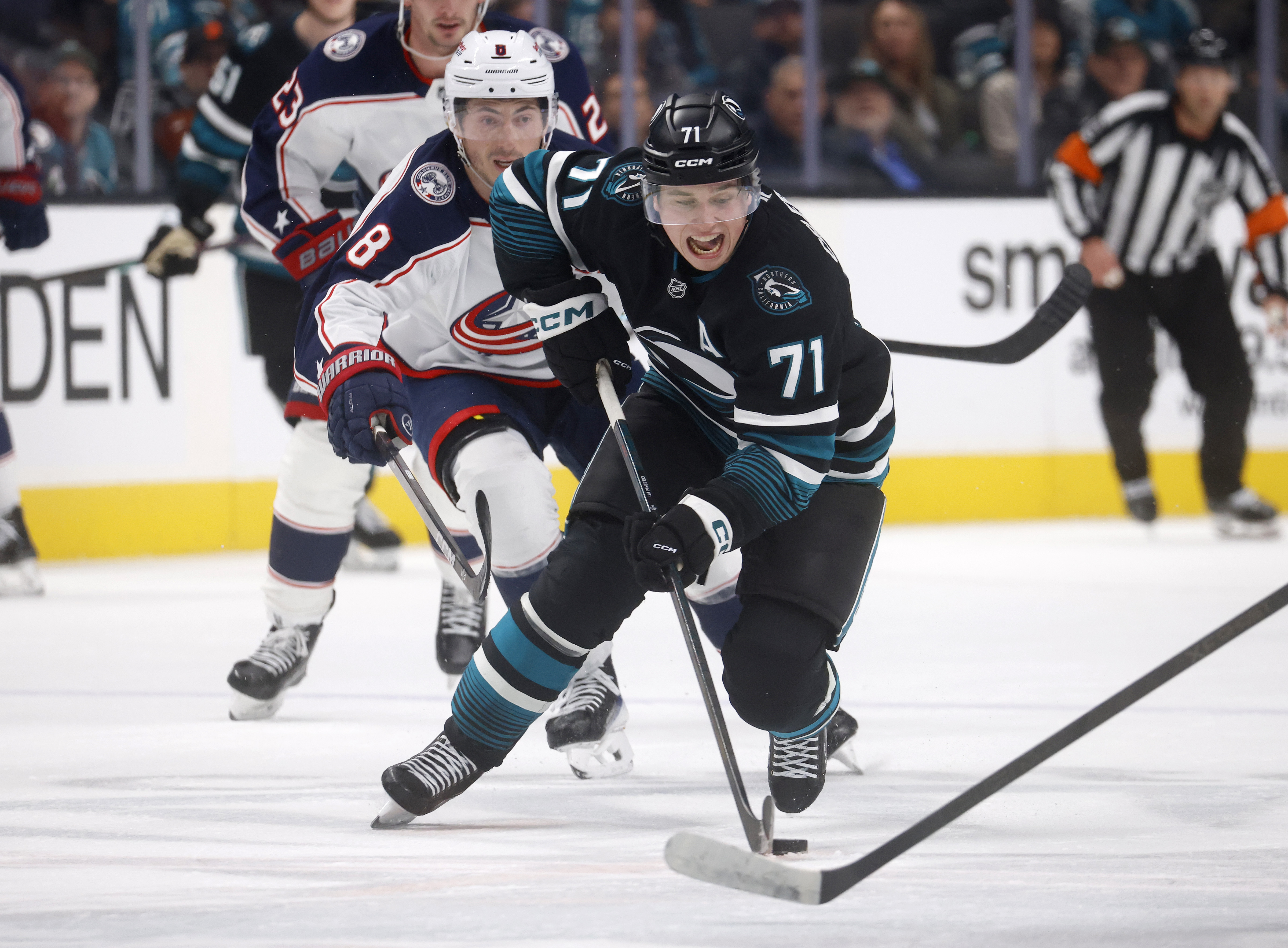 San Jose Sharks’ Macklin Celebrini (71) breaks away to score...