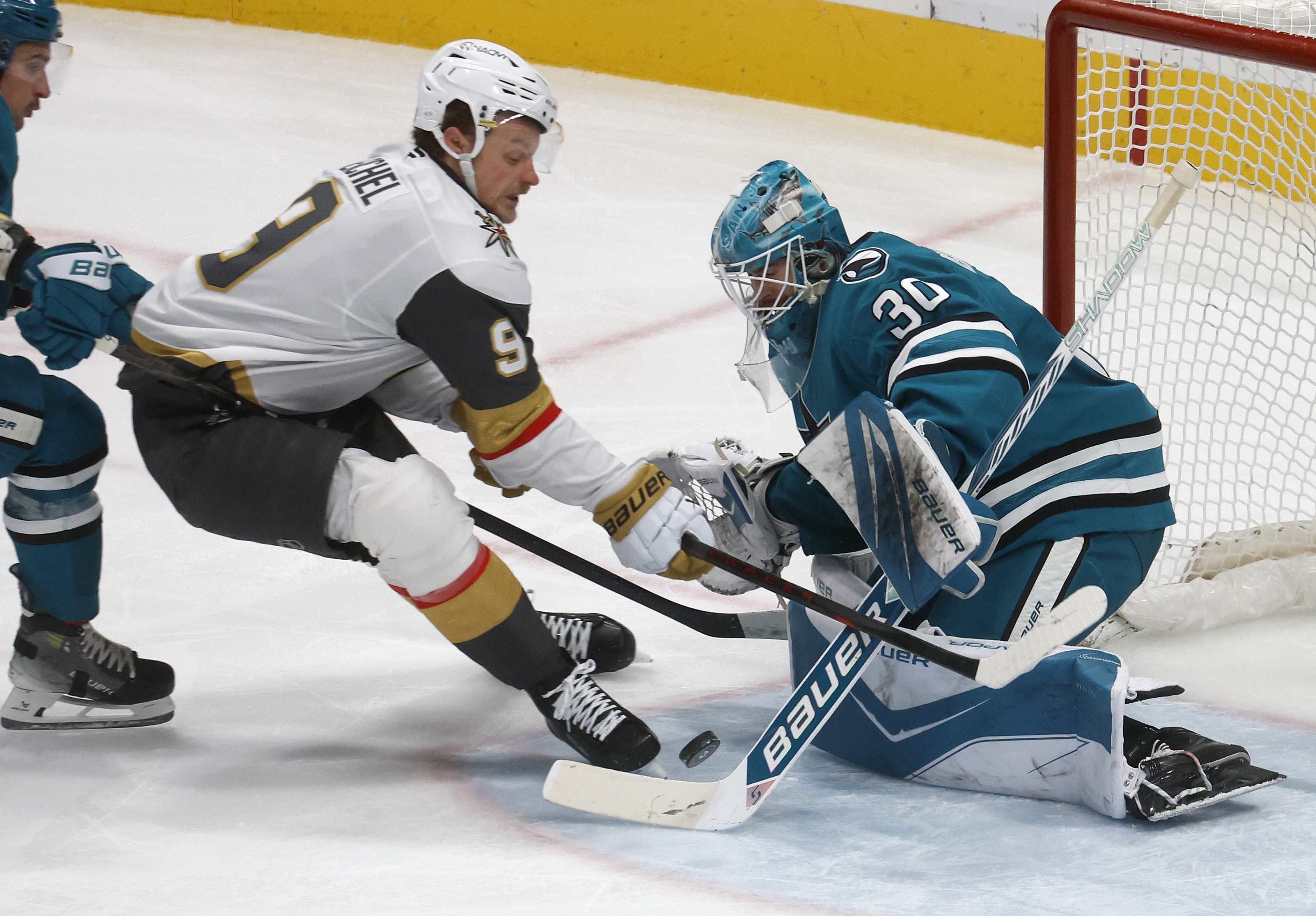 San Jose Sharks goaltender Yaroslav Askarov (30) blocks a shot...
